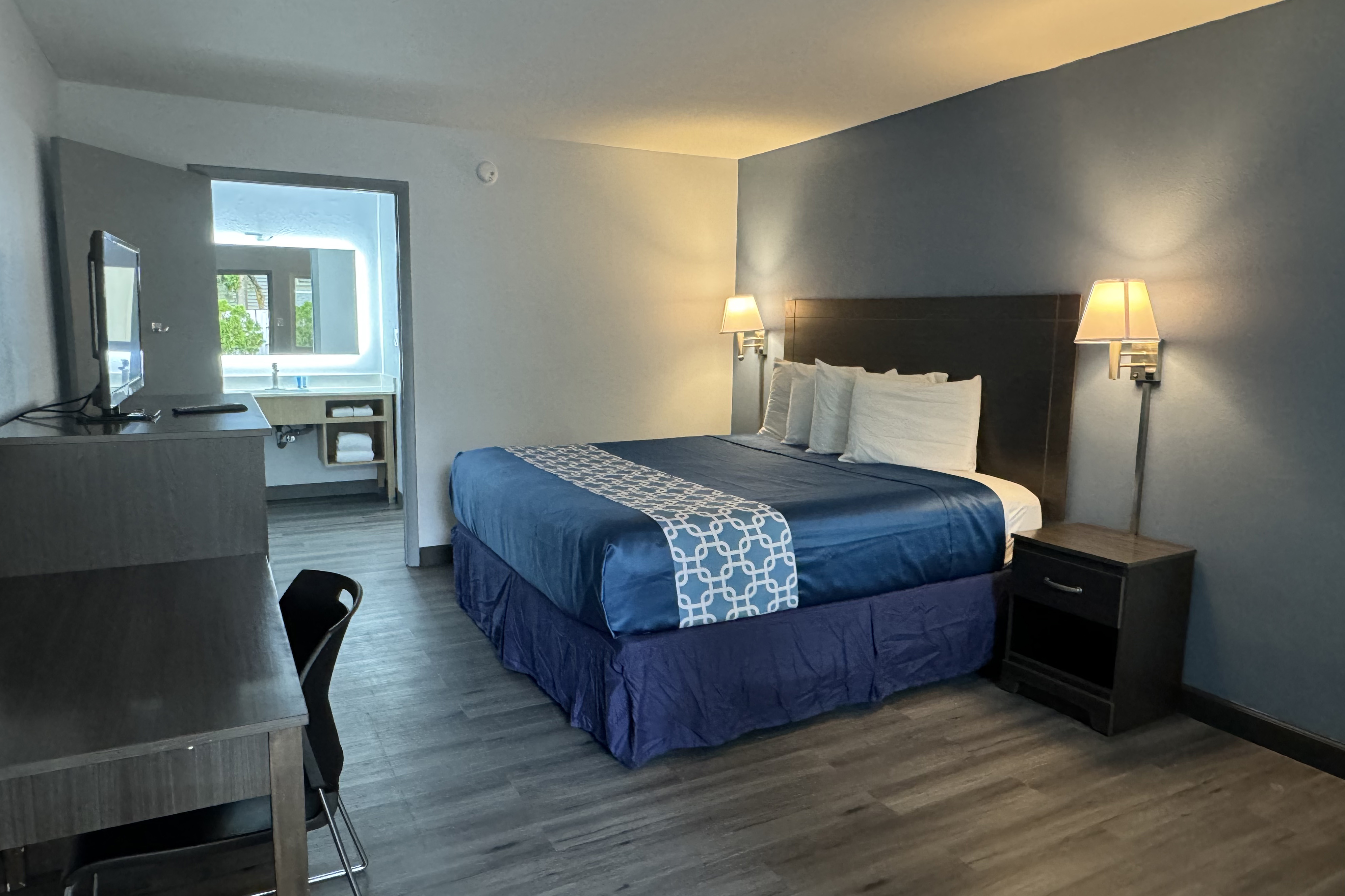 Guest room at the Travelodge by Wyndham Gainesville in Gainesville, Florida