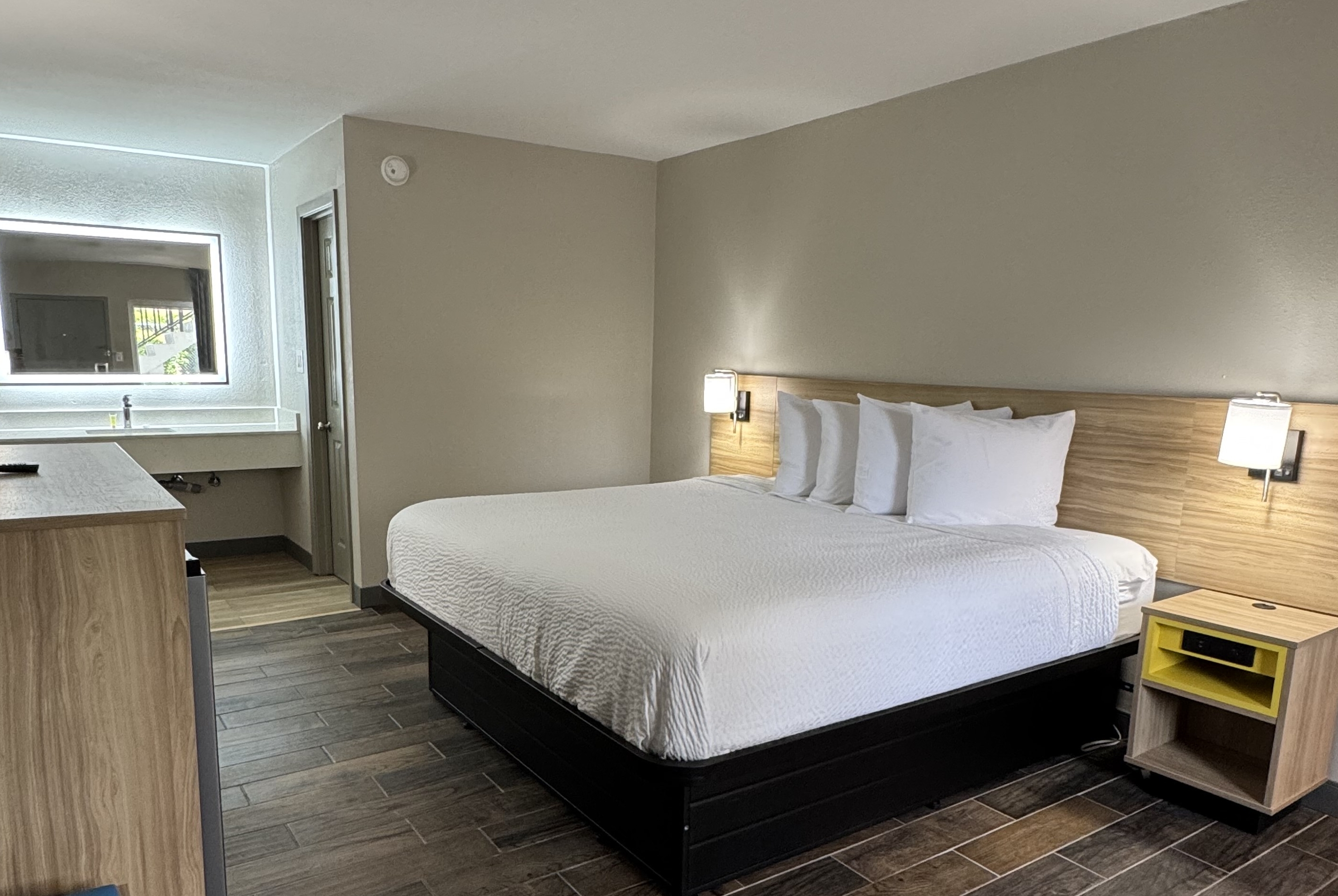 Guest room at the Travelodge by Wyndham Gainesville in Gainesville, Florida