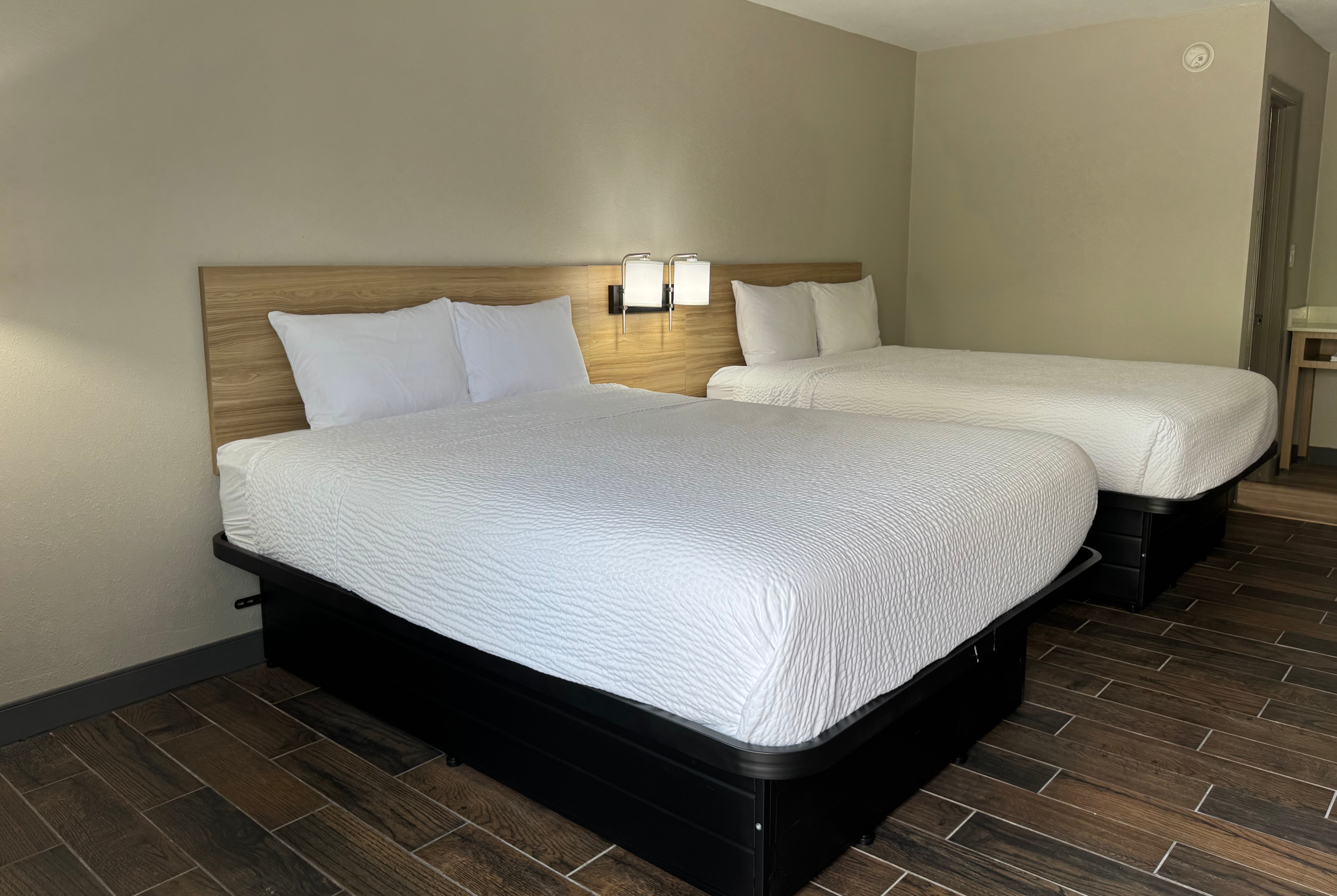 Guest room at the Travelodge by Wyndham Gainesville in Gainesville, Florida