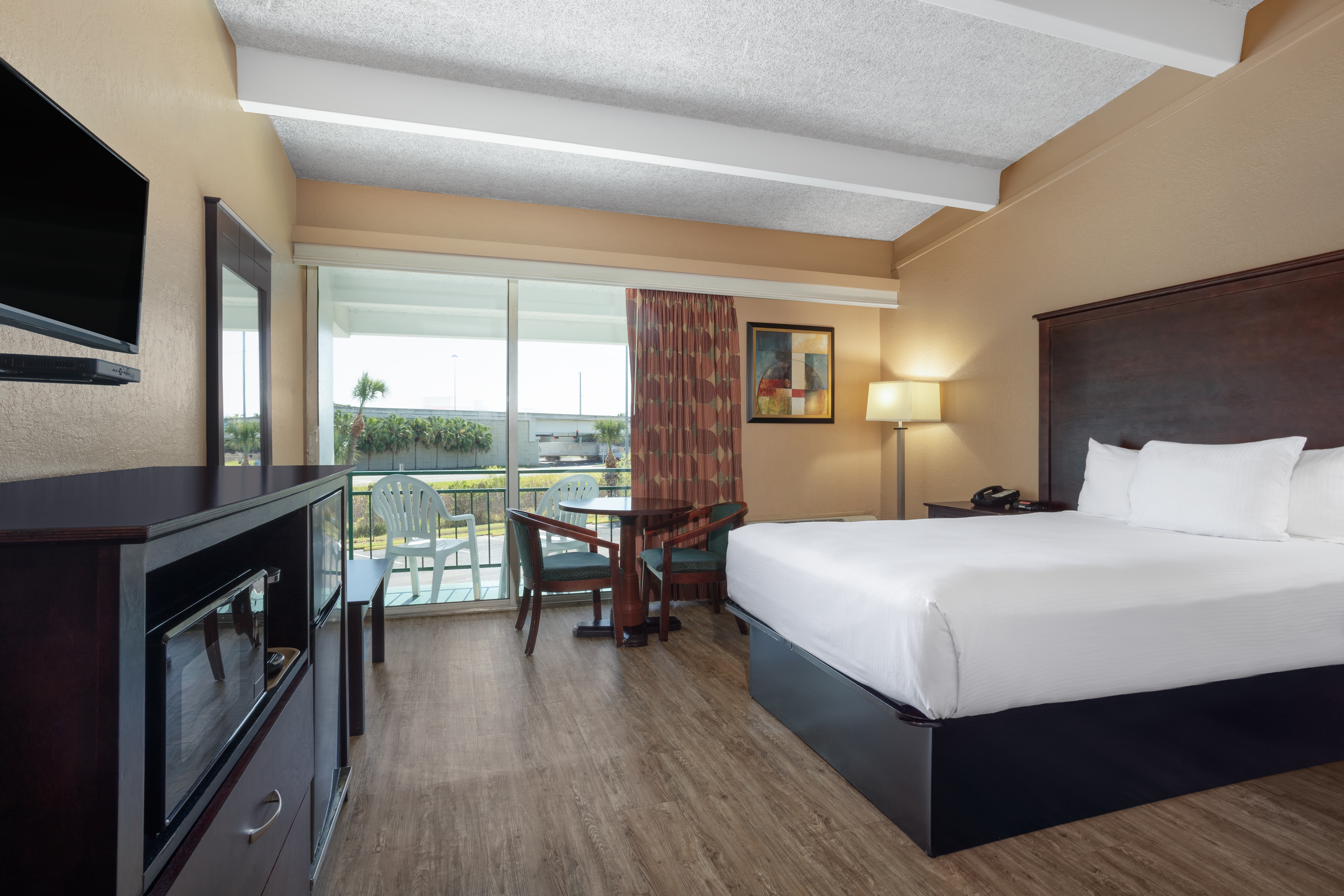 Guest room at the Travelodge by Wyndham Lakeland in Lakeland, Florida