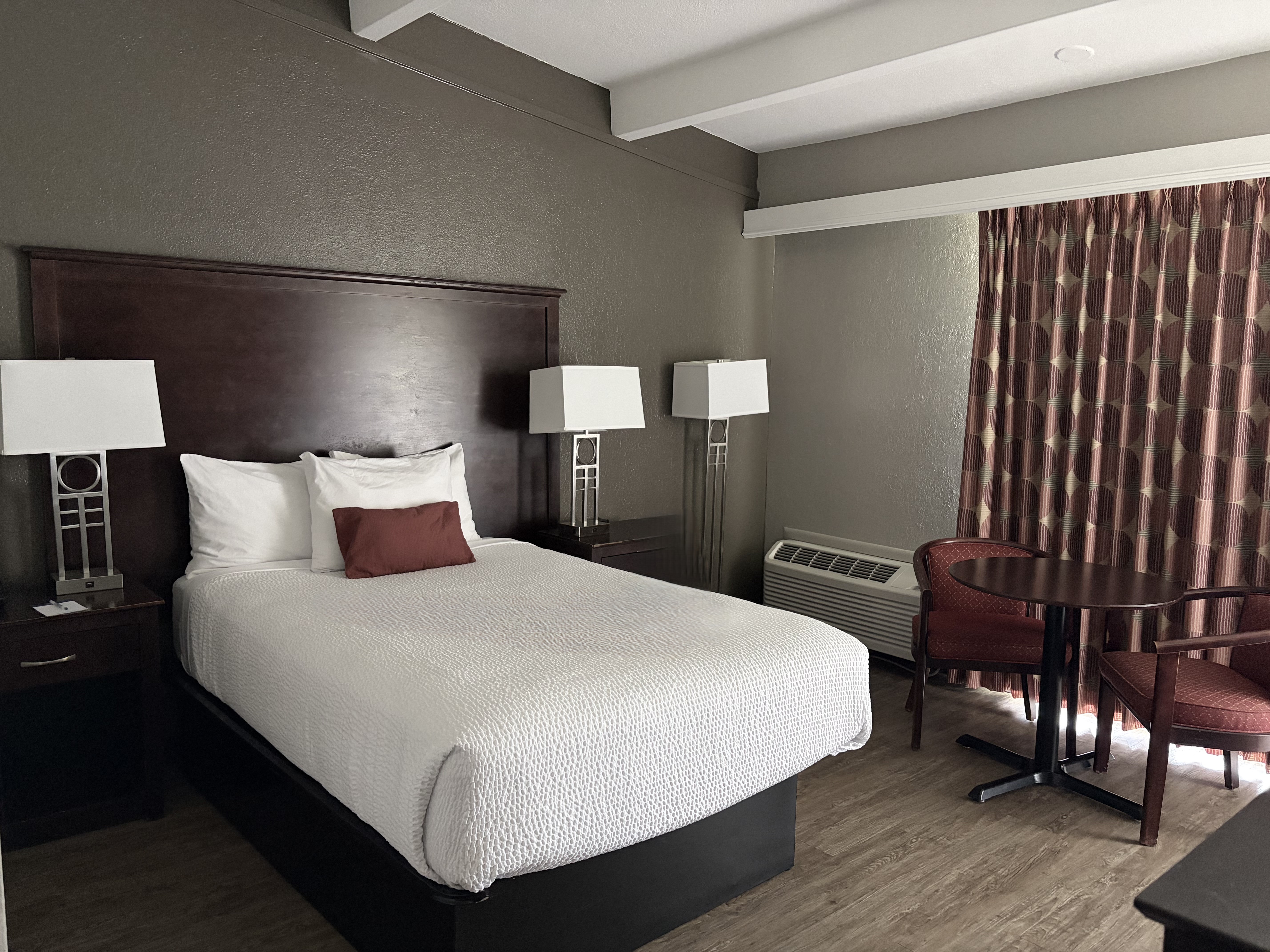 Guest room at the Travelodge by Wyndham Lakeland in Lakeland, Florida