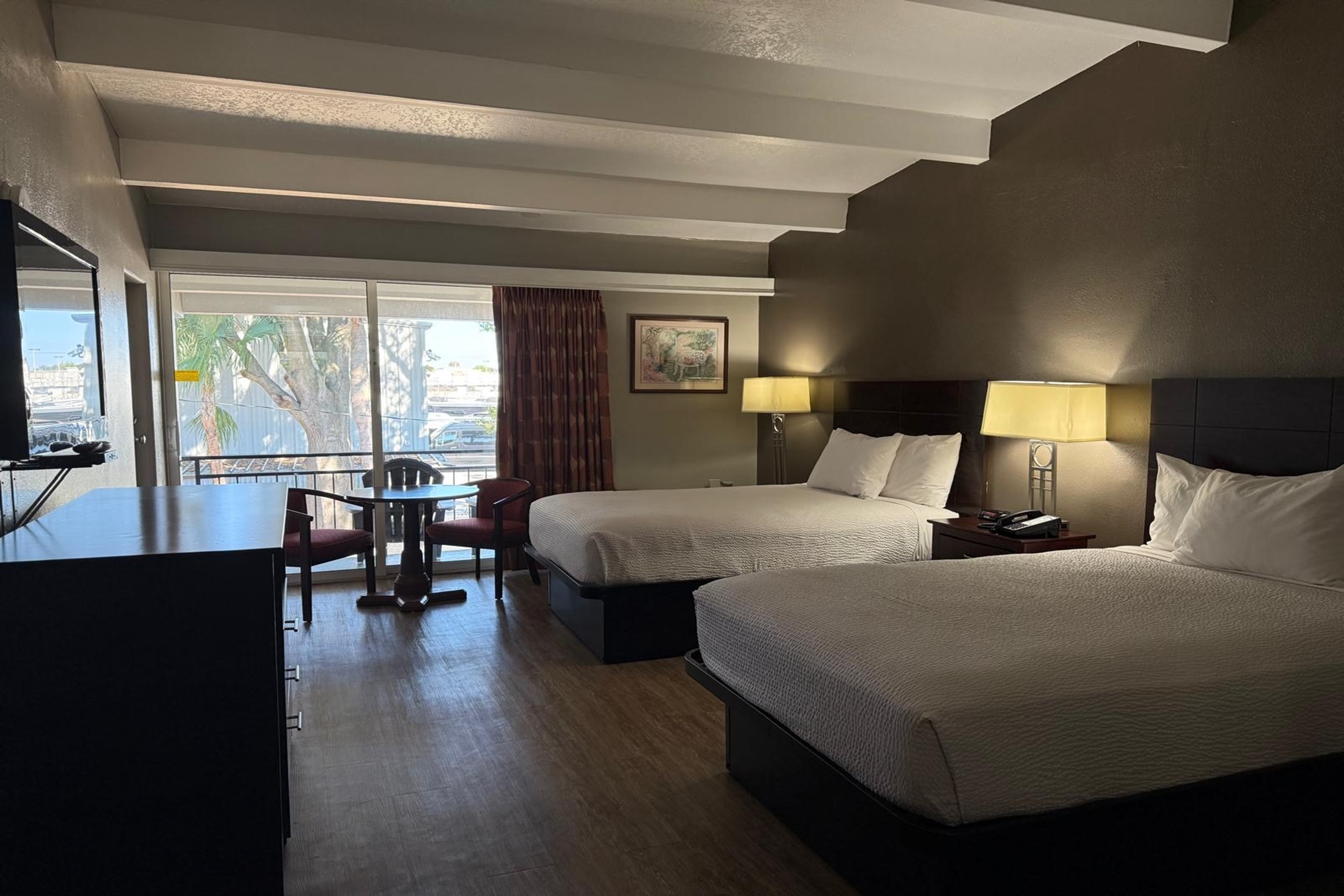 Guest room at the Travelodge by Wyndham Lakeland in Lakeland, Florida