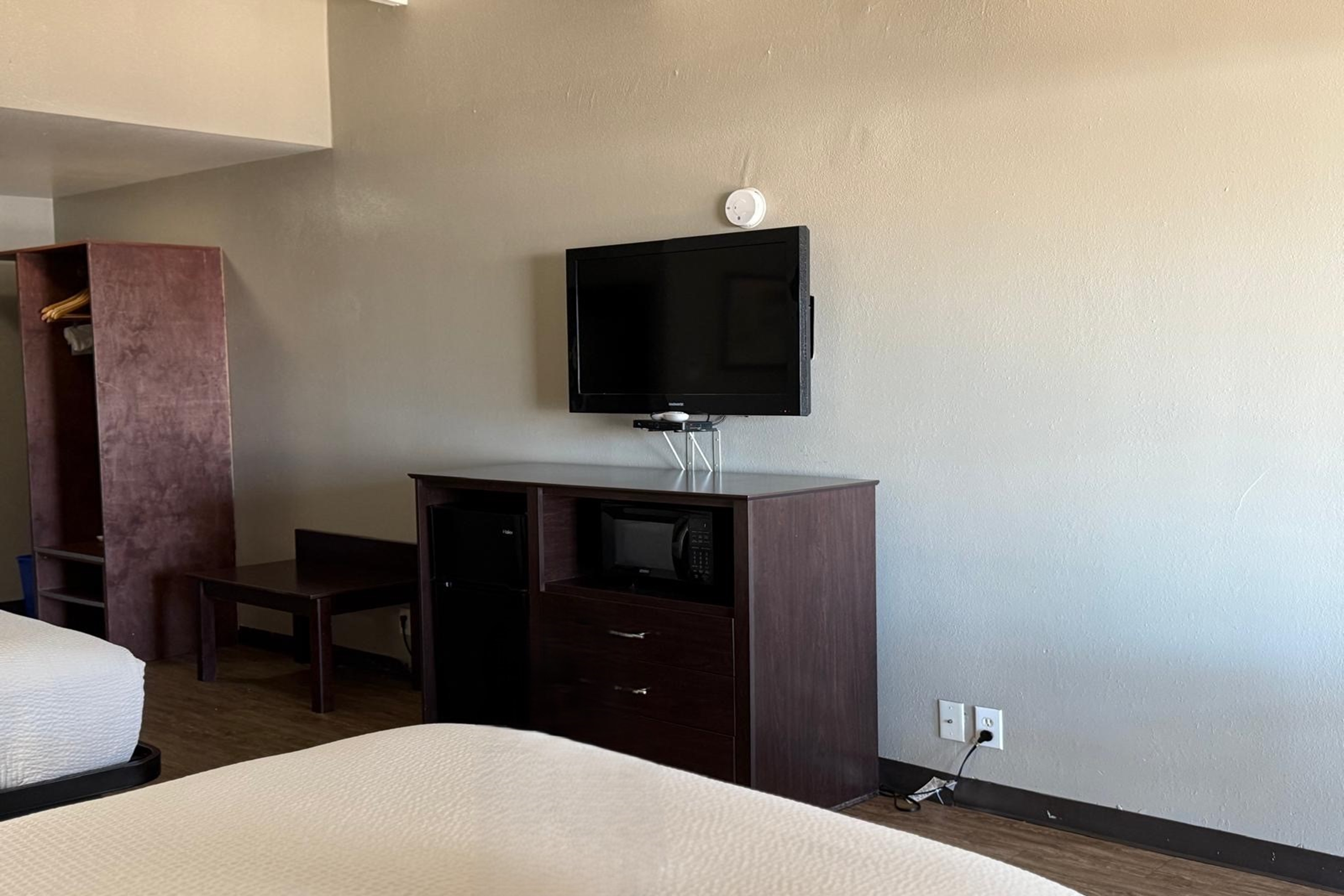 Guest room at the Travelodge by Wyndham Lakeland in Lakeland, Florida