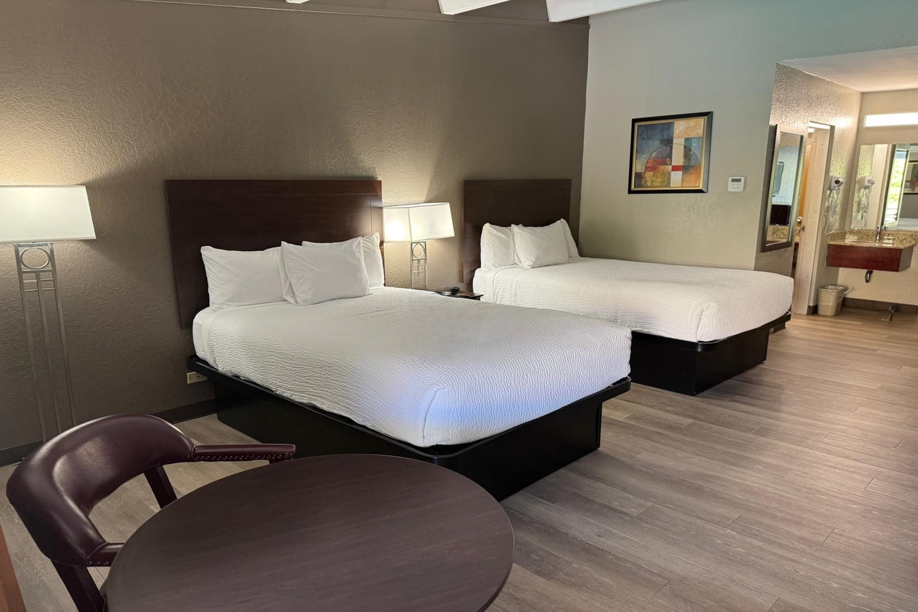 Guest room at the Travelodge by Wyndham Lakeland in Lakeland, Florida