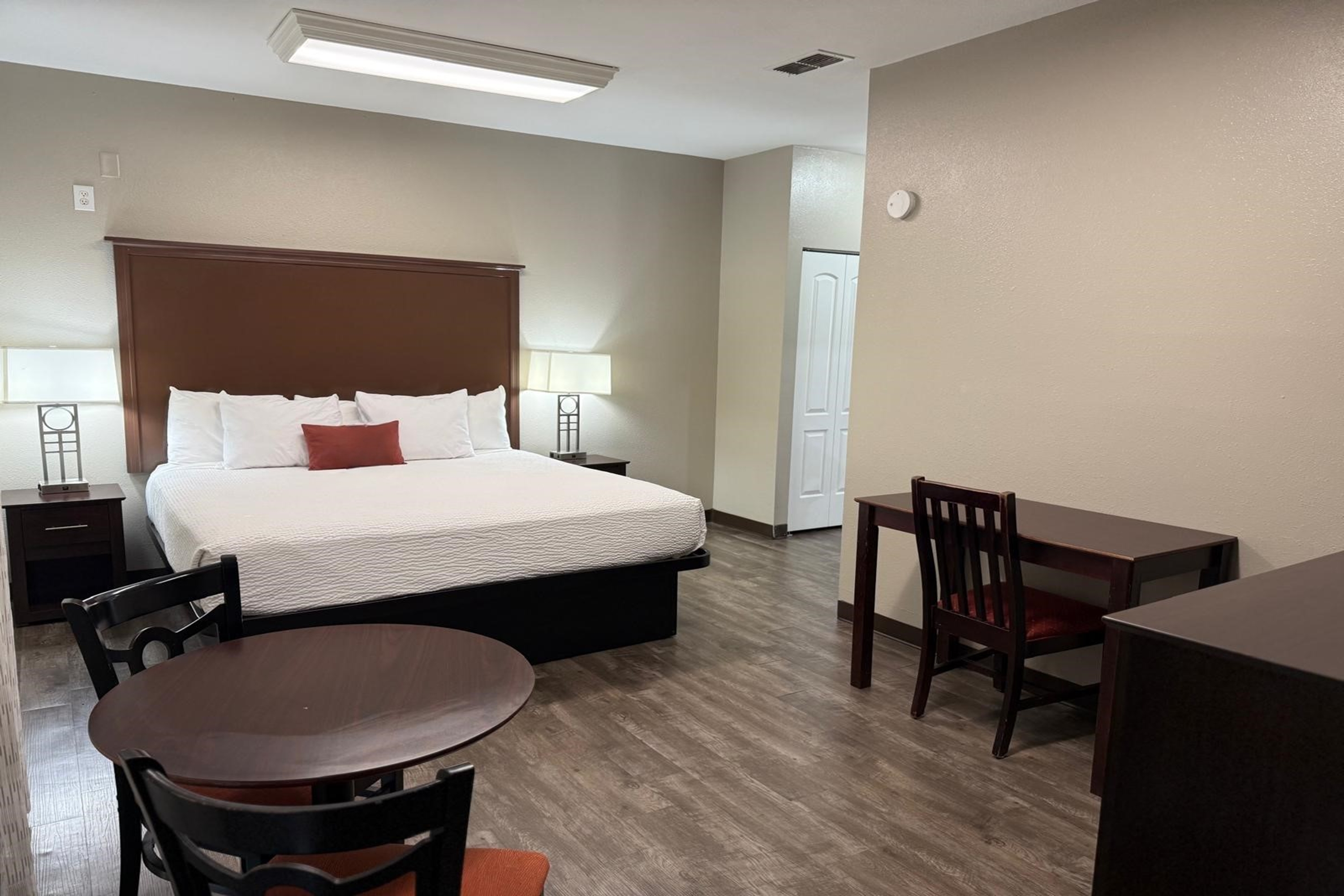 Guest room at the Travelodge by Wyndham Lakeland in Lakeland, Florida