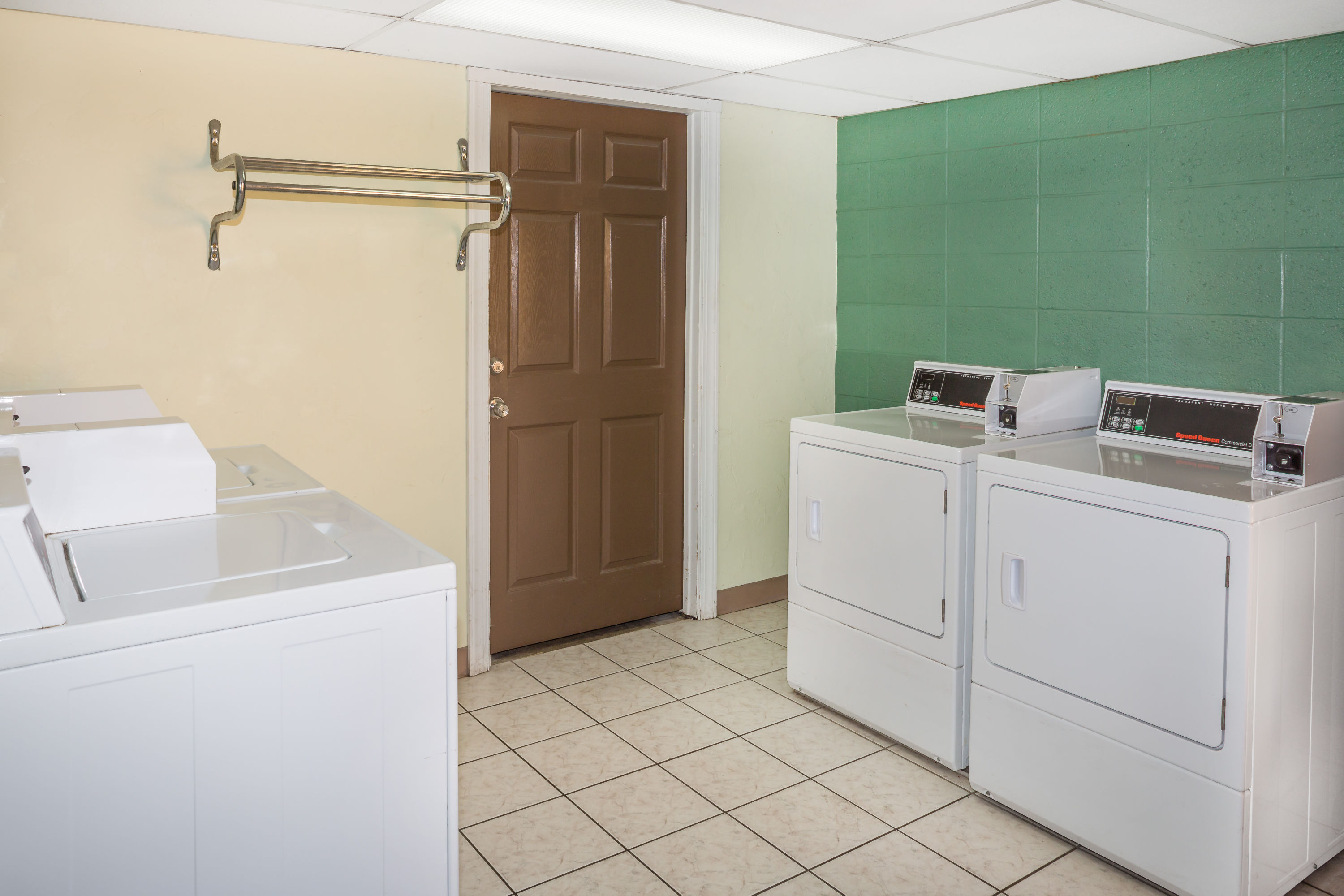 Laundry facilities at Travelodge by Wyndham Fort Myers North in North Fort Myers, Florida