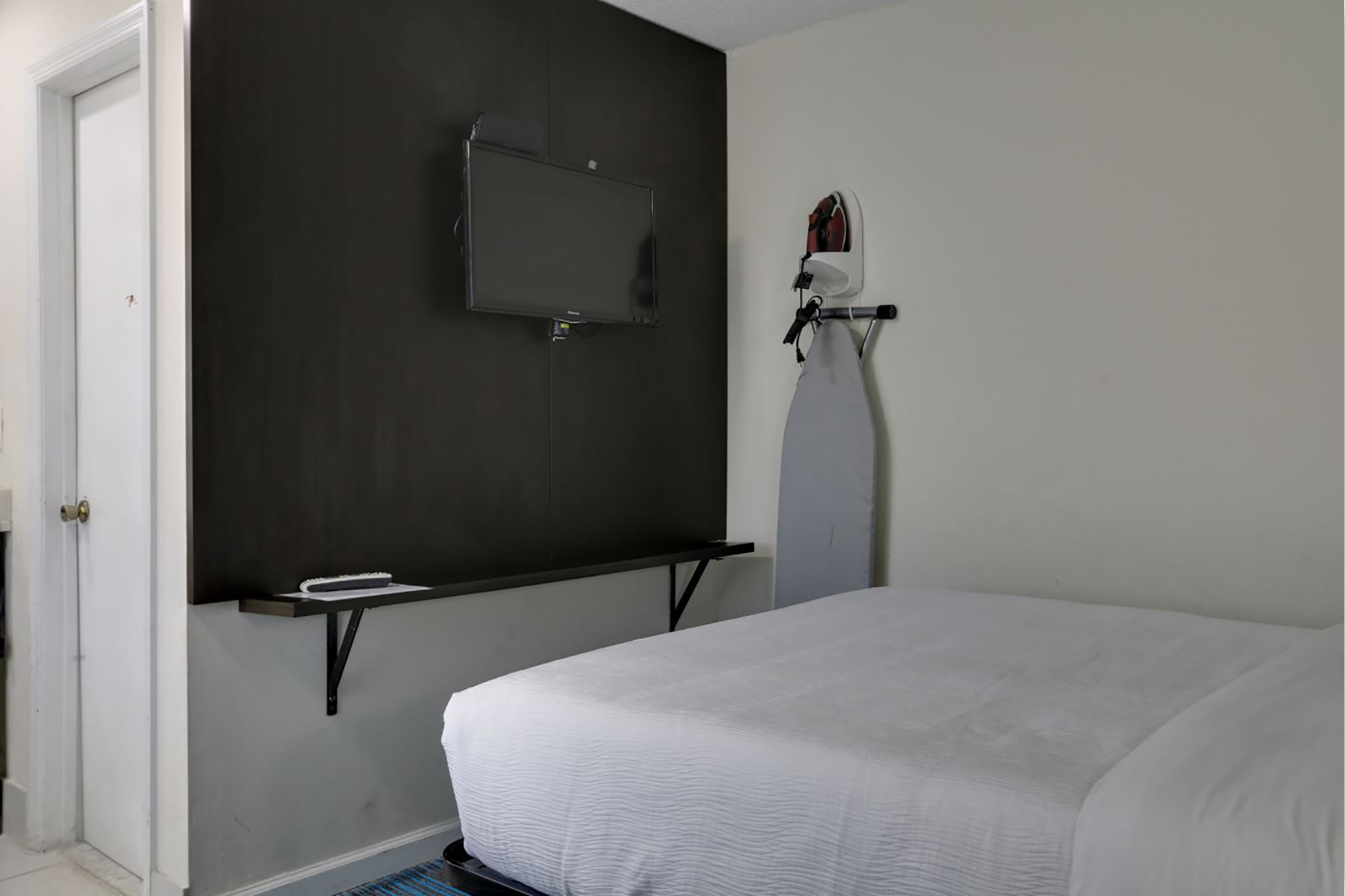 Guest room at the Travelodge by Wyndham Calhoun South I-75 in Calhoun, Georgia