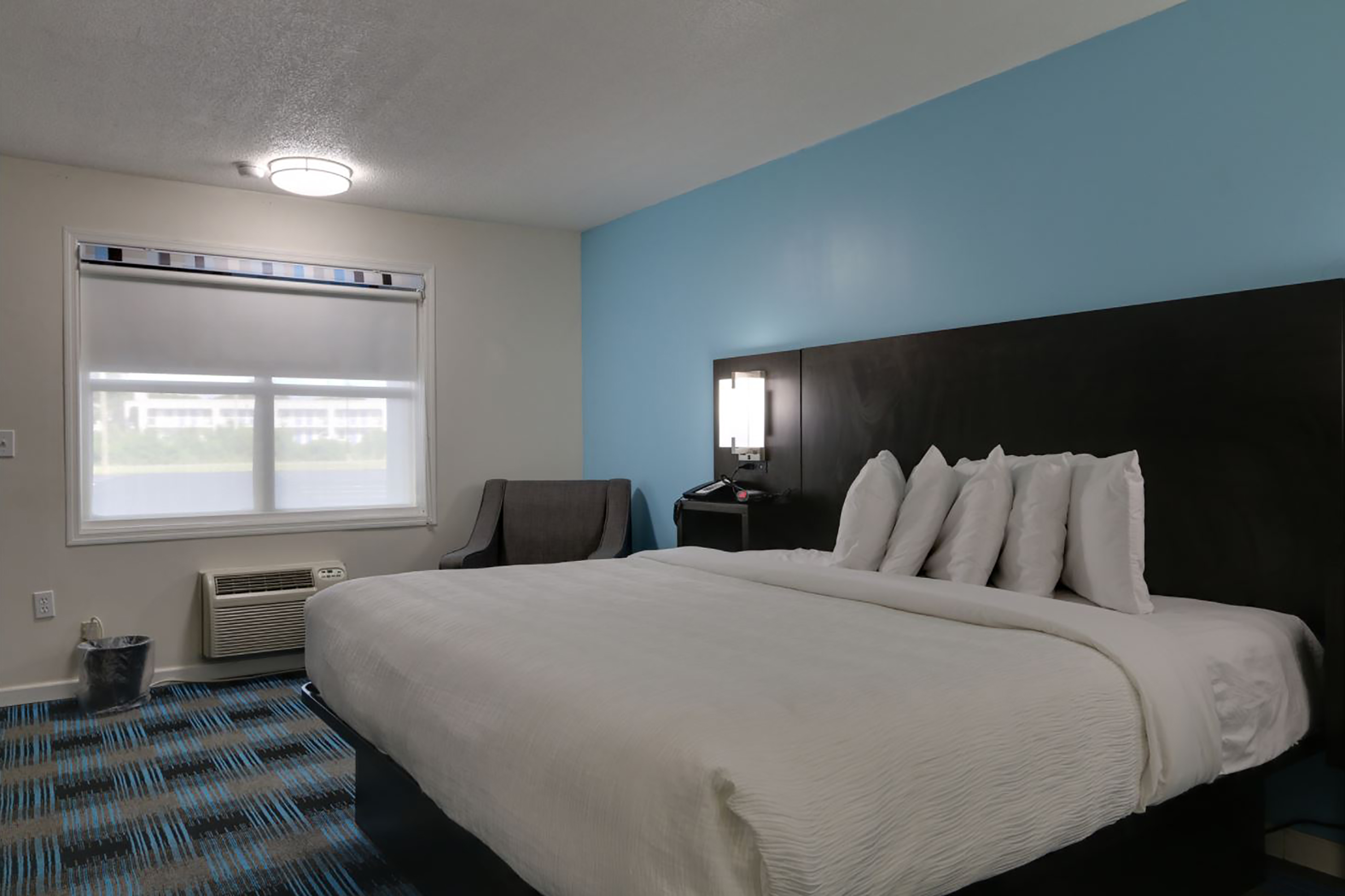 Guest room at the Travelodge by Wyndham Calhoun South I-75 in Calhoun, Georgia