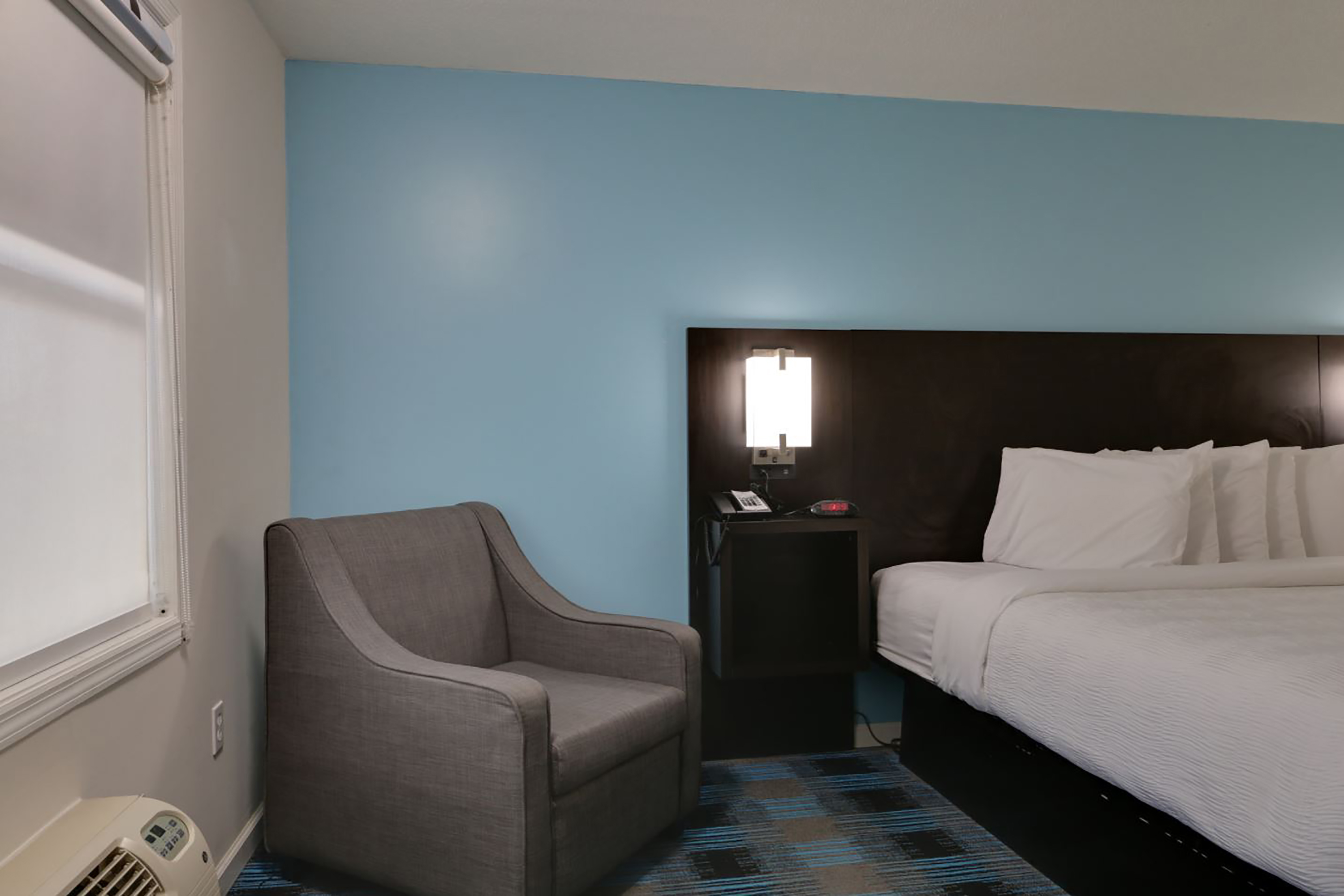 Guest room at the Travelodge by Wyndham Calhoun South I-75 in Calhoun, Georgia