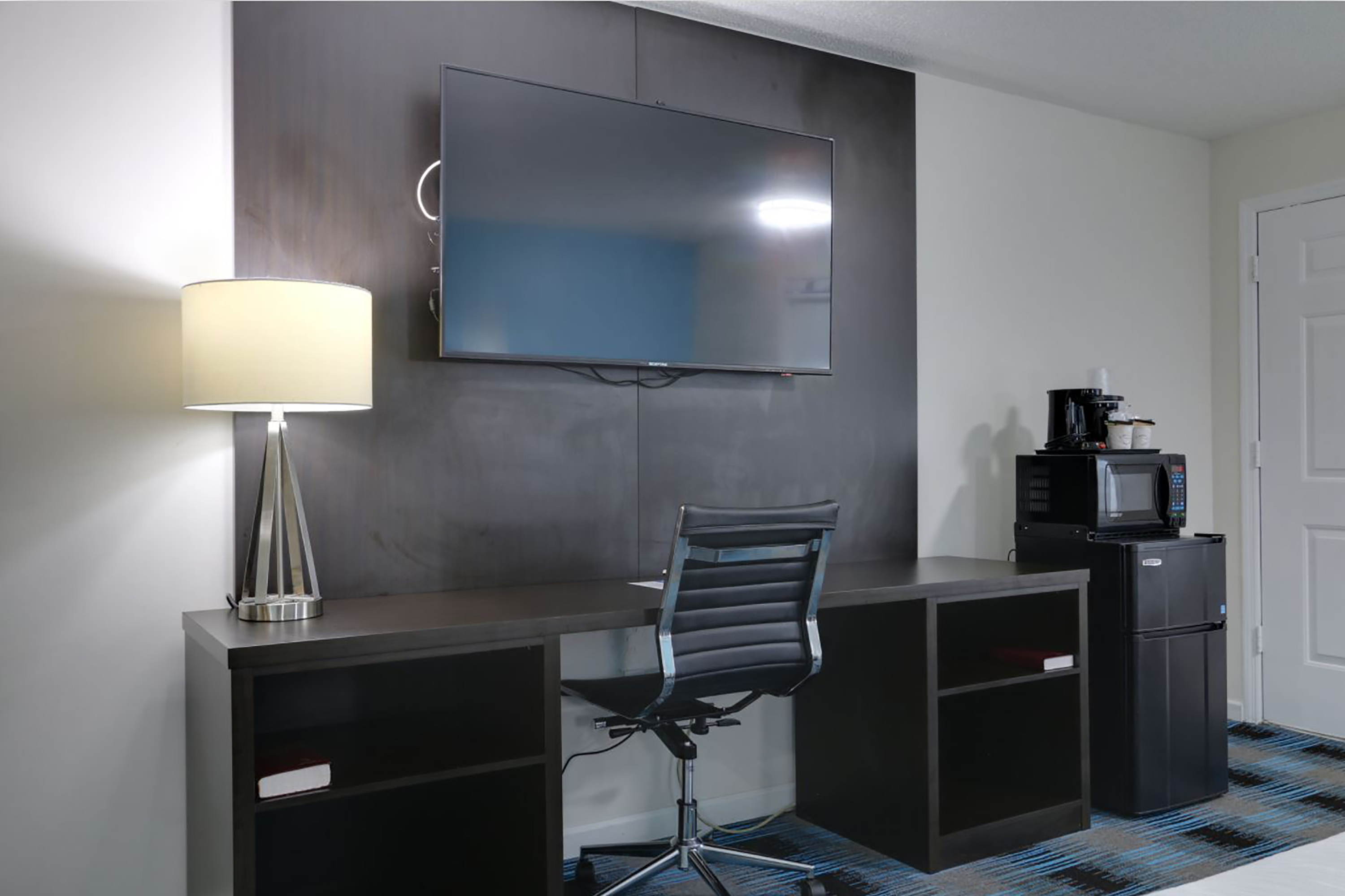 Guest room at the Travelodge by Wyndham Calhoun South I-75 in Calhoun, Georgia