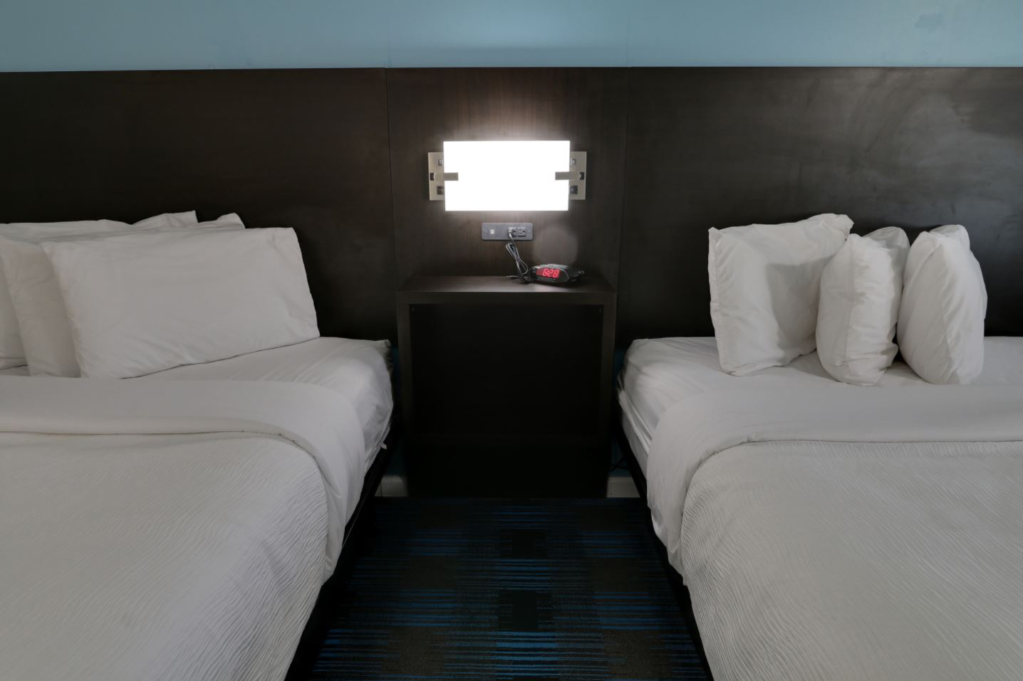 Guest room at the Travelodge by Wyndham Calhoun South I-75 in Calhoun, Georgia