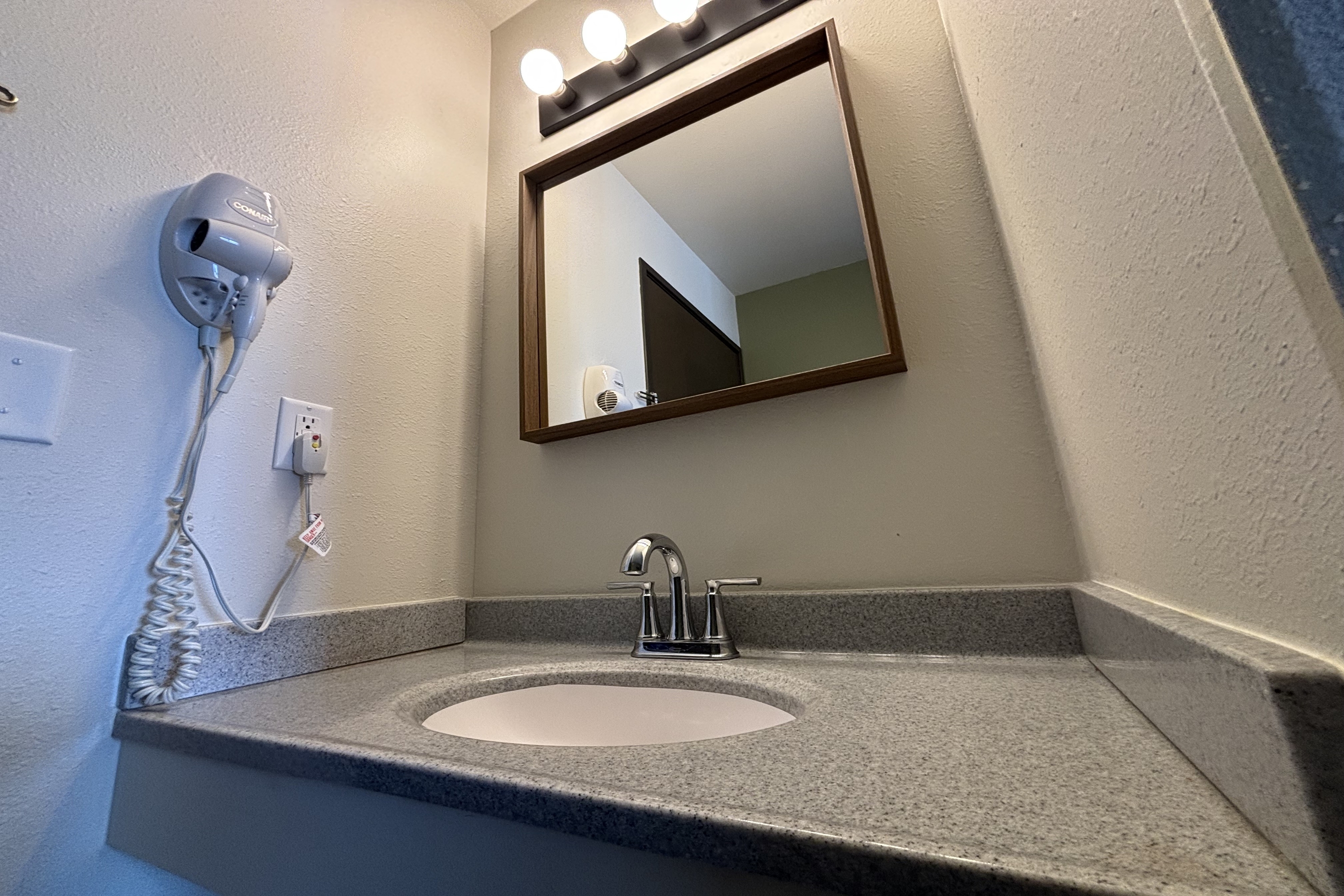 Guest room bath at the Travelodge by Wyndham Atlanta, Illinois in Atlanta, Illinois