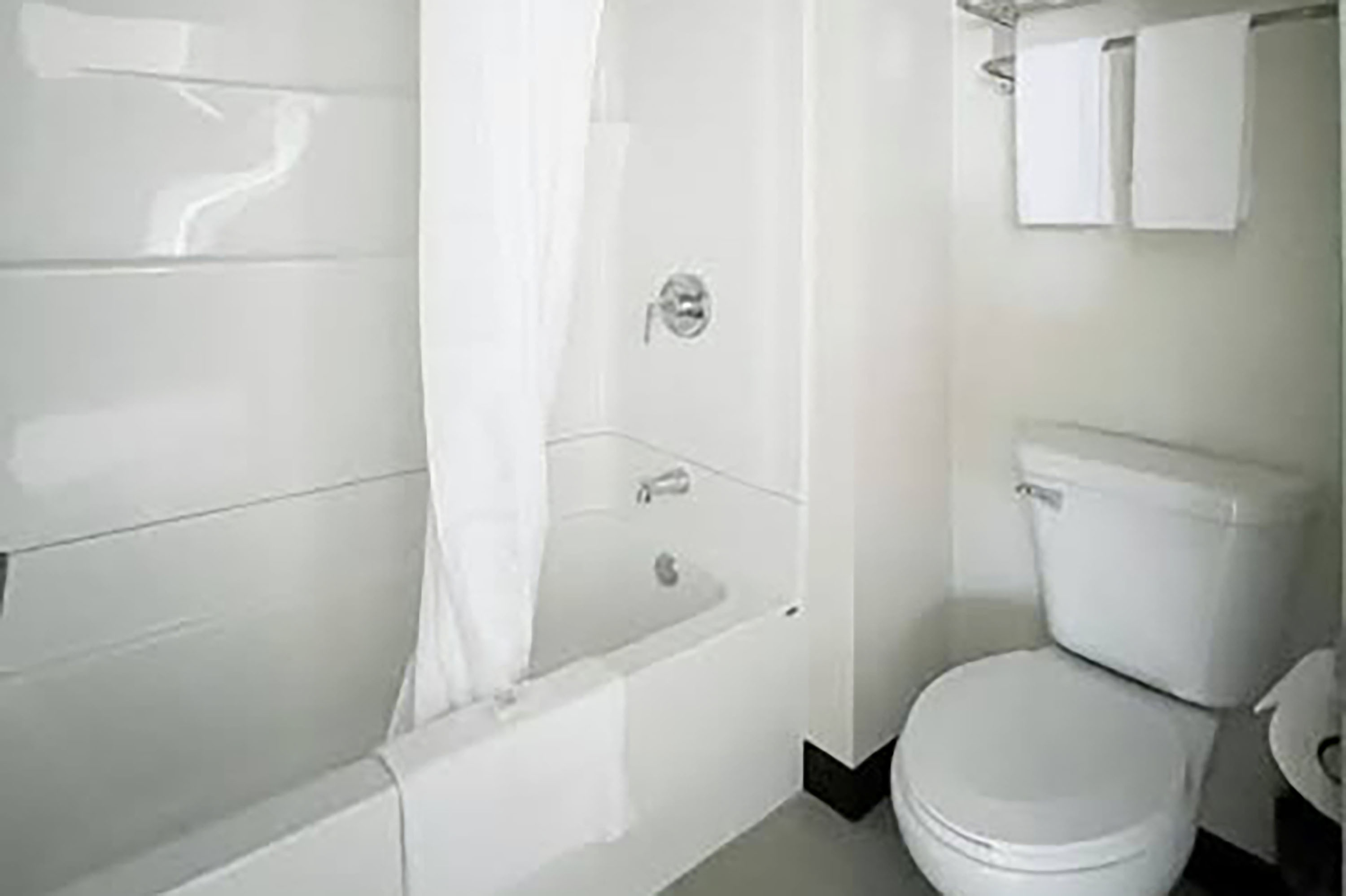 Guest room bath at the Travelodge by Wyndham Atlanta, Illinois in Atlanta, Illinois