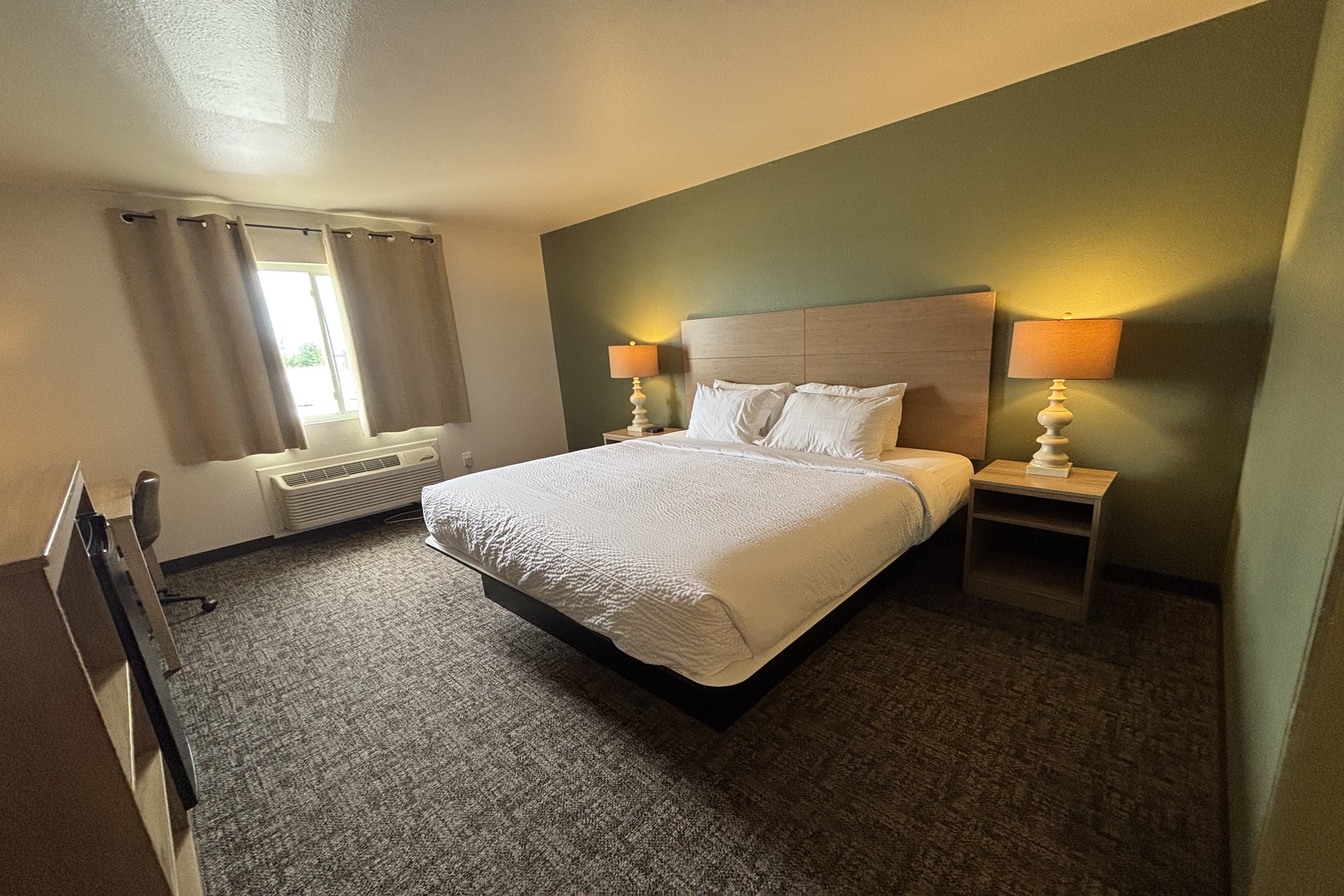 Guest room at the Travelodge by Wyndham Atlanta, Illinois in Atlanta, Illinois