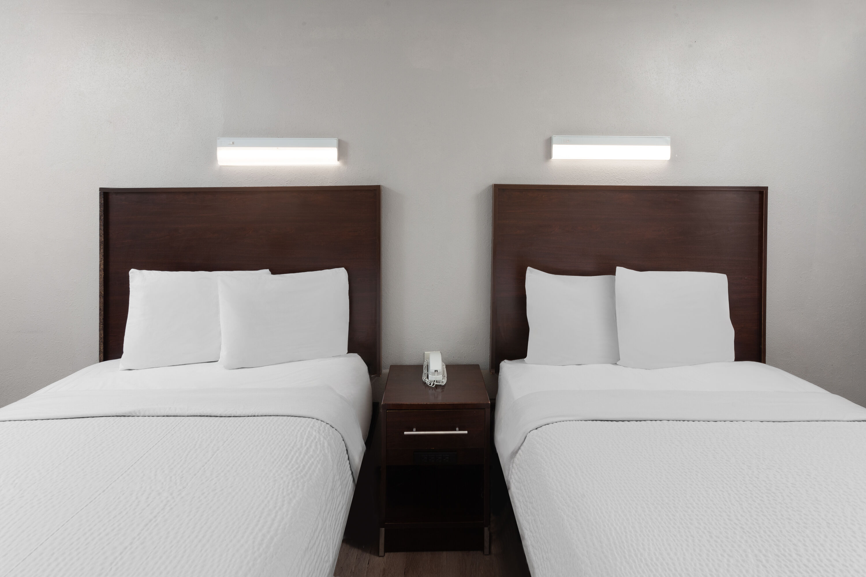 Guest room at the Travelodge by Wyndham Peoria in Peoria, Illinois