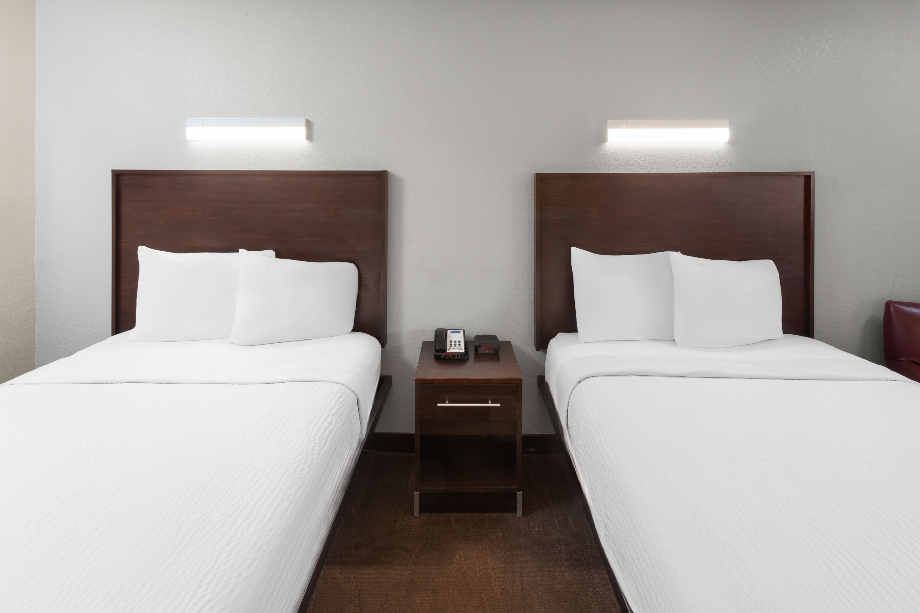 Guest room at the Travelodge by Wyndham Peoria in Peoria, Illinois