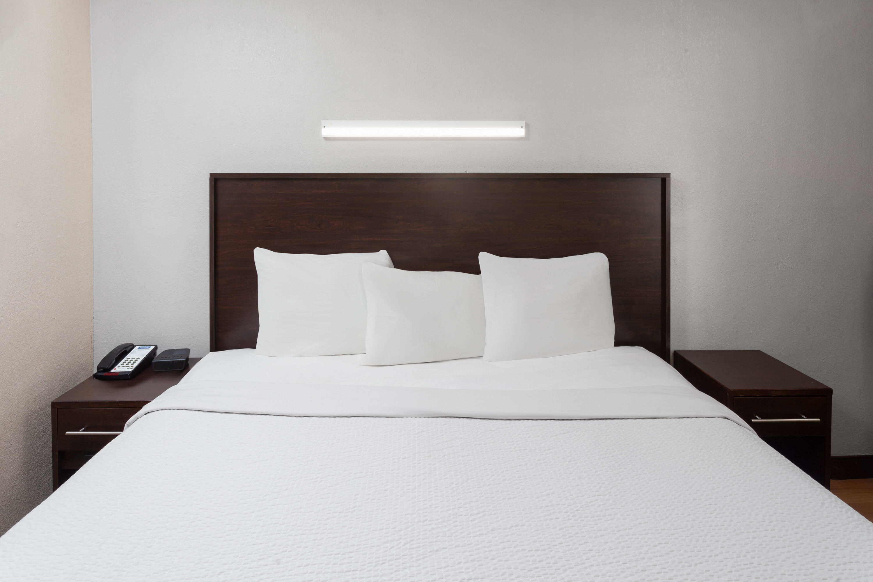 Guest room at the Travelodge by Wyndham Peoria in Peoria, Illinois