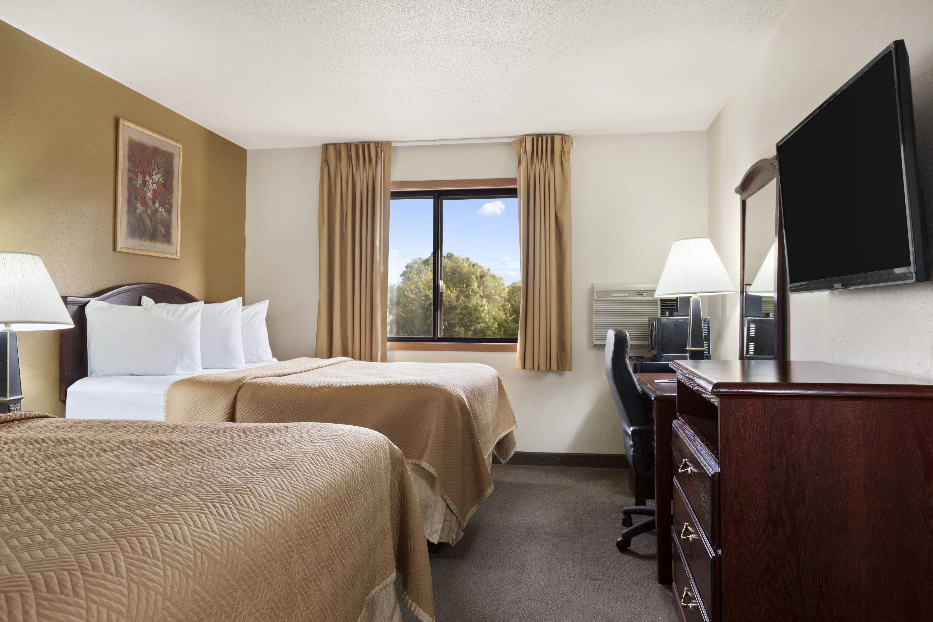 Guest room at the Travelodge by Wyndham La Porte/Michigan City Area in LaPorte, Indiana