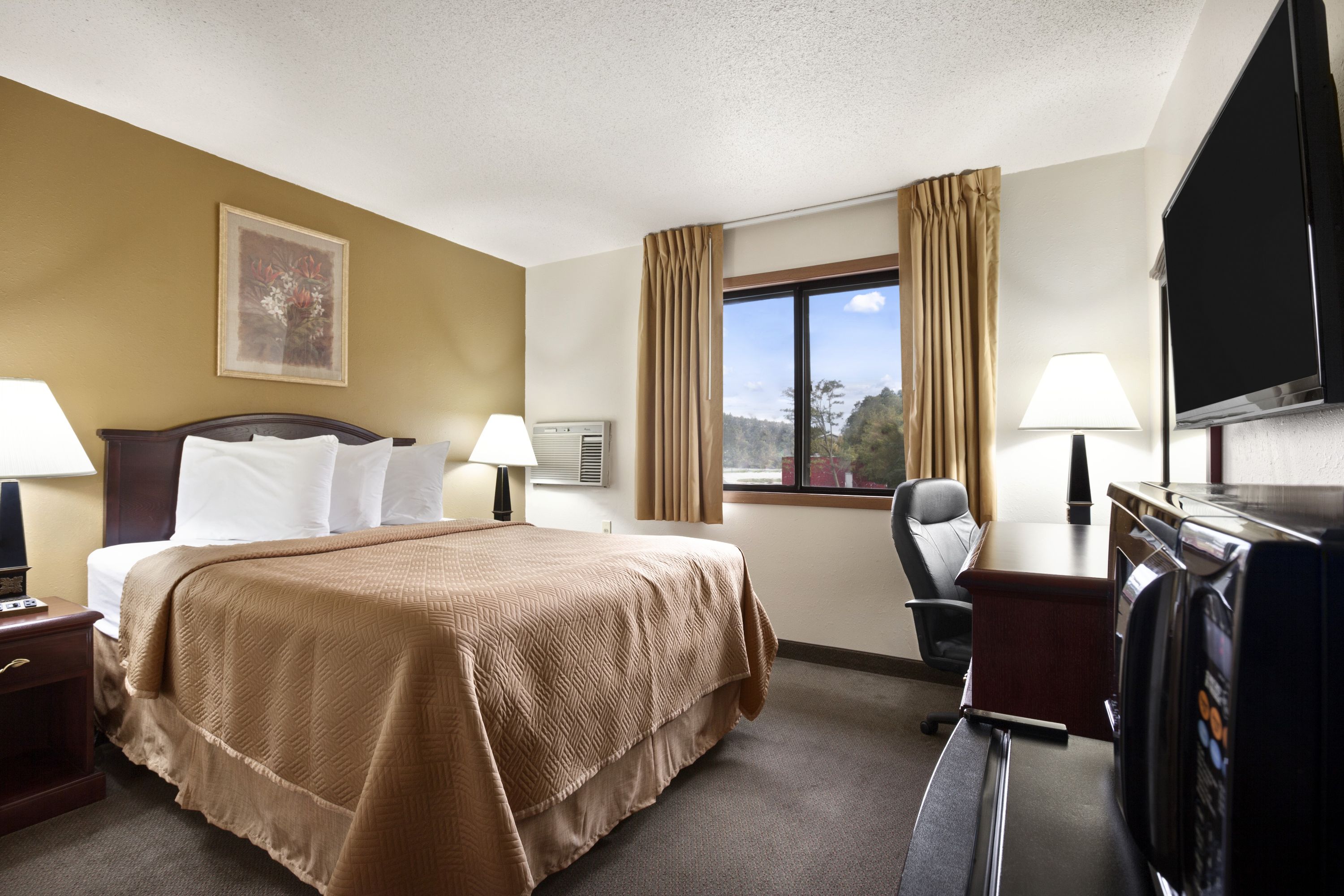 Guest room at the Travelodge by Wyndham La Porte/Michigan City Area in LaPorte, Indiana