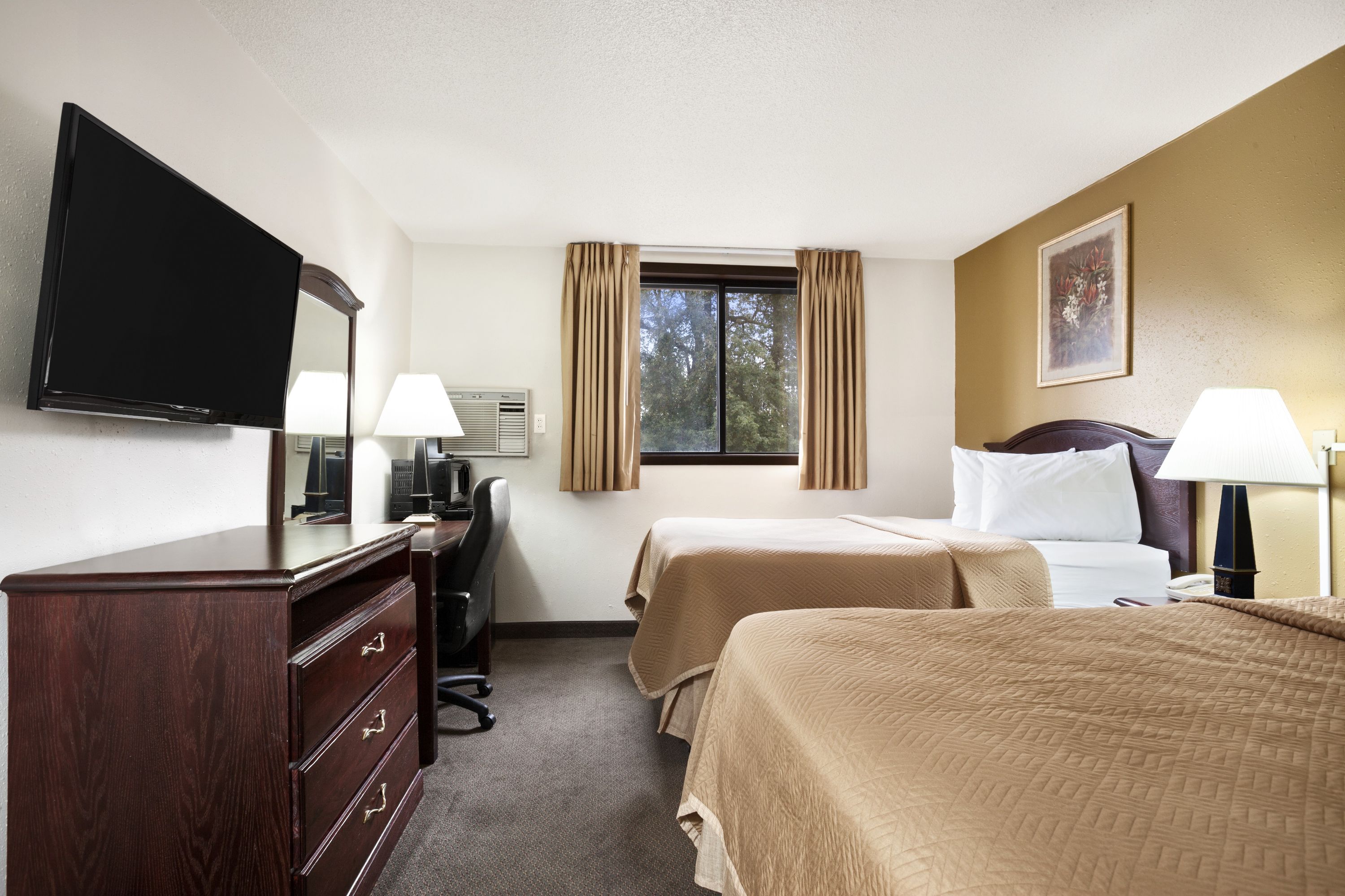 Guest room at the Travelodge by Wyndham La Porte/Michigan City Area in LaPorte, Indiana