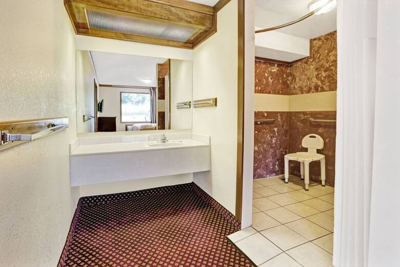 Guest room at the Travelodge Sellersburg in Sellersburg, Indiana