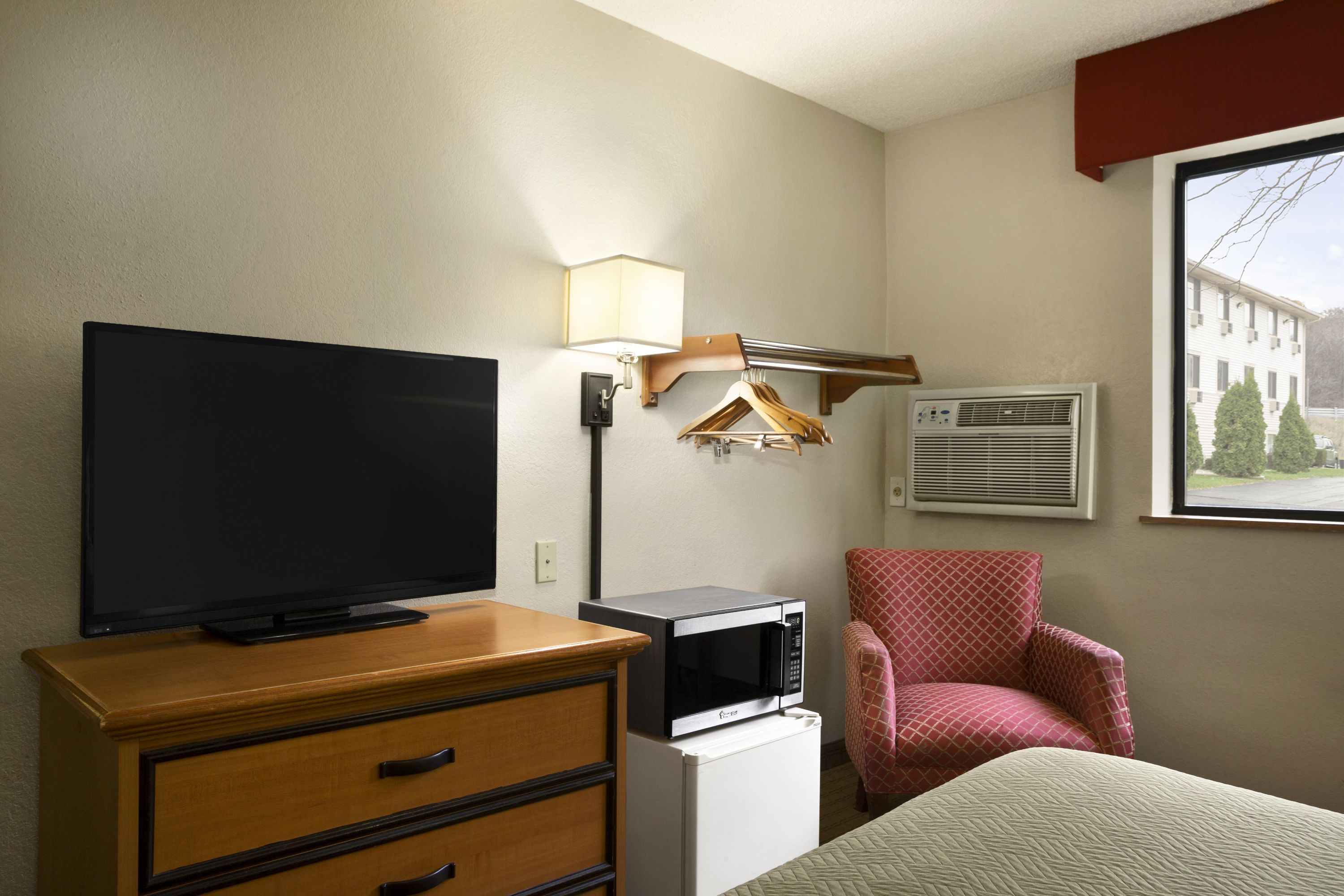 Guest room at the Travelodge by Wyndham Battle Creek in Battle Creek, Michigan
