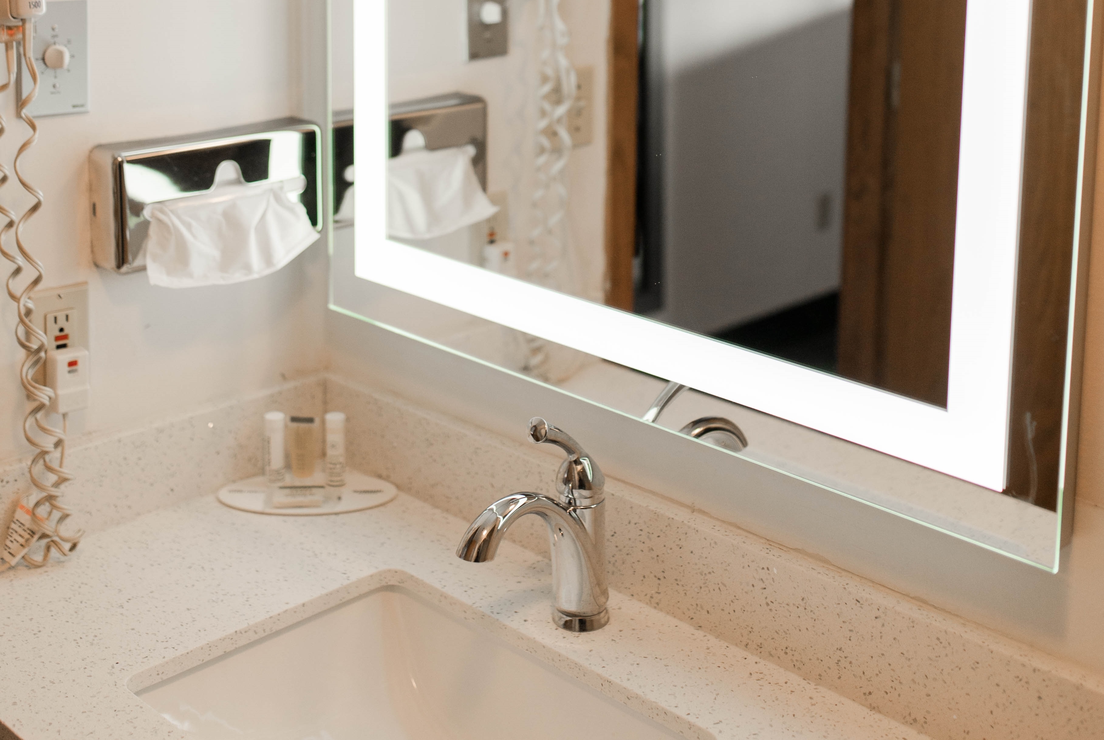 Guest room bath at the Travelodge by Wyndham Escanaba in Escanaba, Michigan