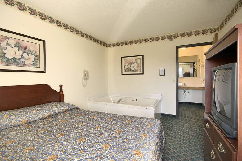 Guest room at the Travelodge Hudsonville in Hudsonville, Michigan