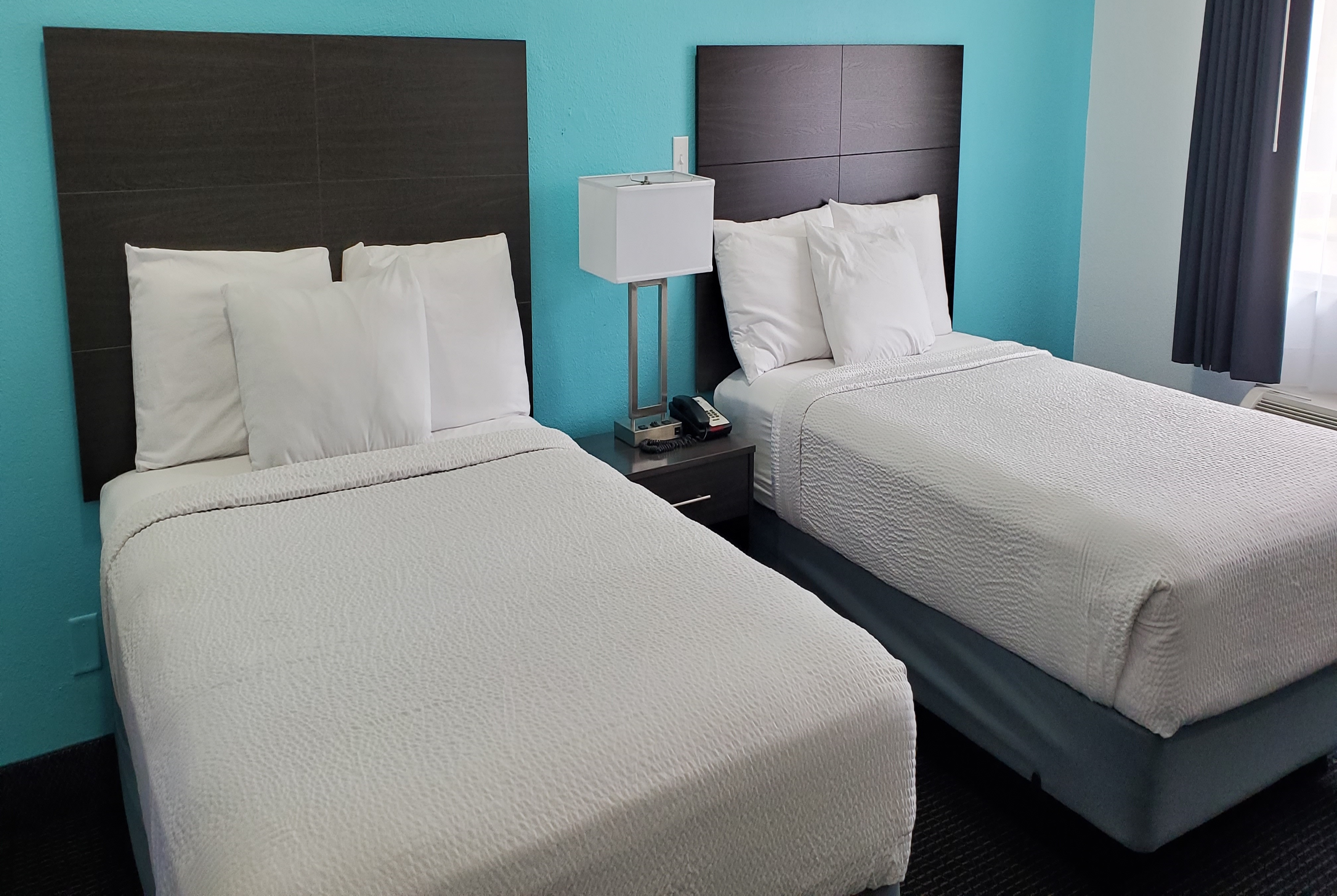 Guest room at the Travelodge by Wyndham Livonia/Canton/Novi Detroit Area in Livonia, Michigan