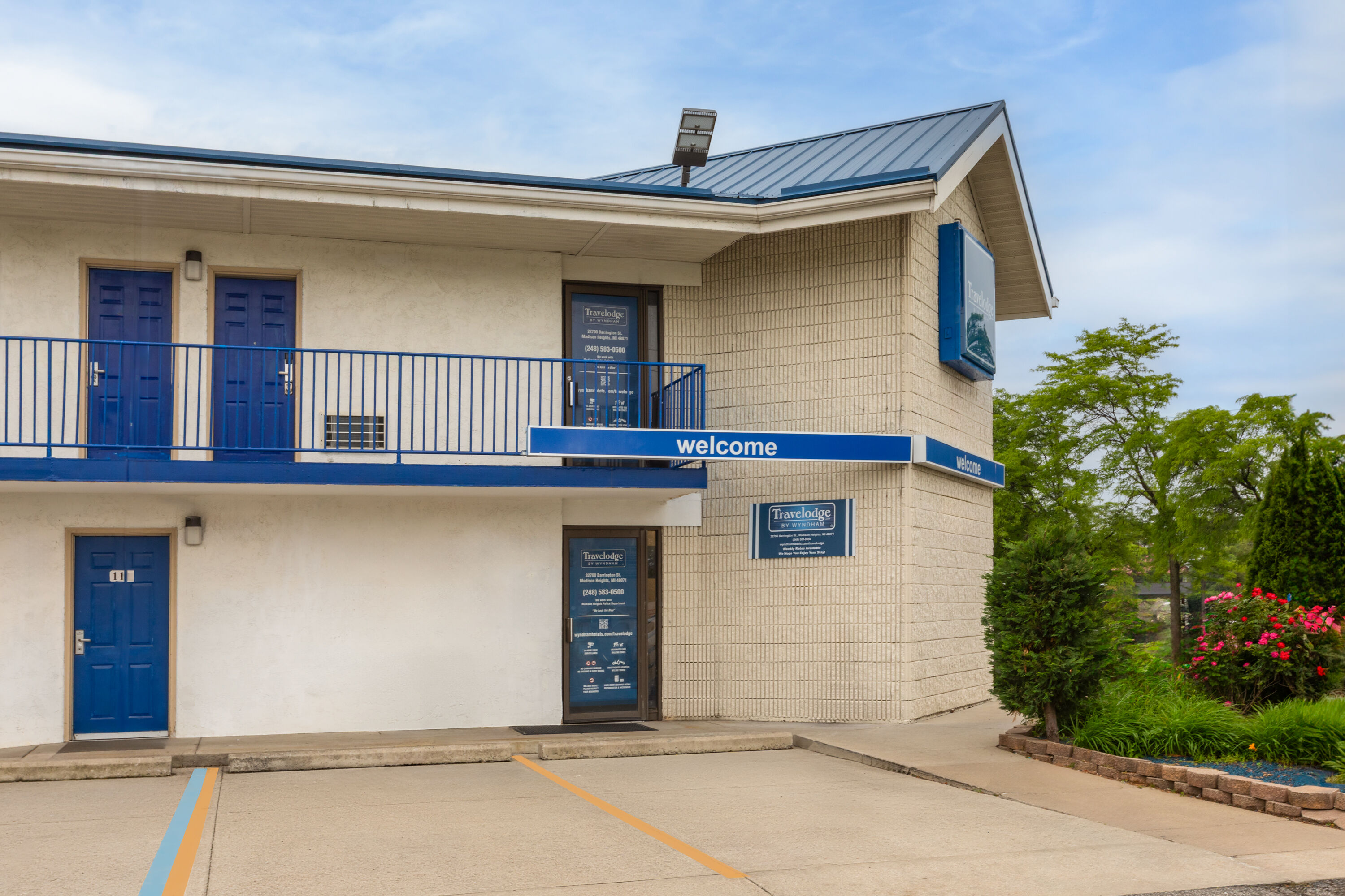 Exterior Day Image of Travelodge by Wyndham Madison Heights MI hotel in Madison Heights, Michigan