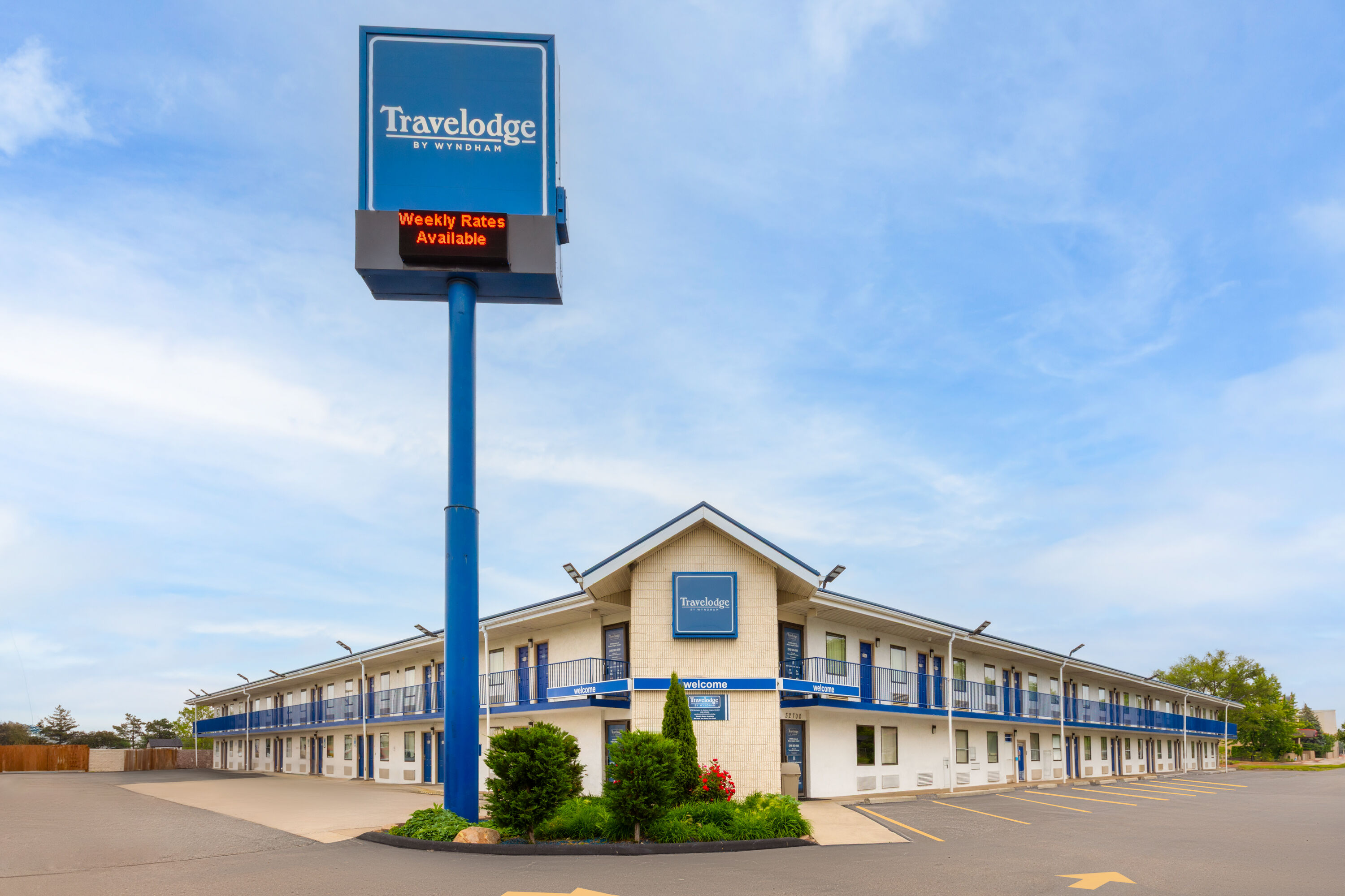 Exterior Day Image of Travelodge by Wyndham Madison Heights MI hotel in Madison Heights, Michigan