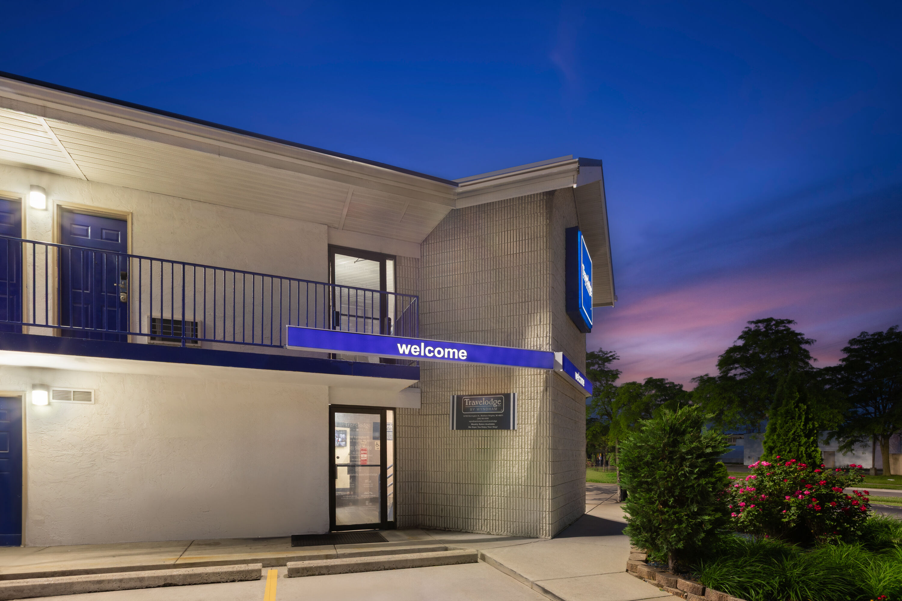 Exterior Dusk Image of Travelodge by Wyndham Madison Heights MI hotel in Madison Heights, Michigan