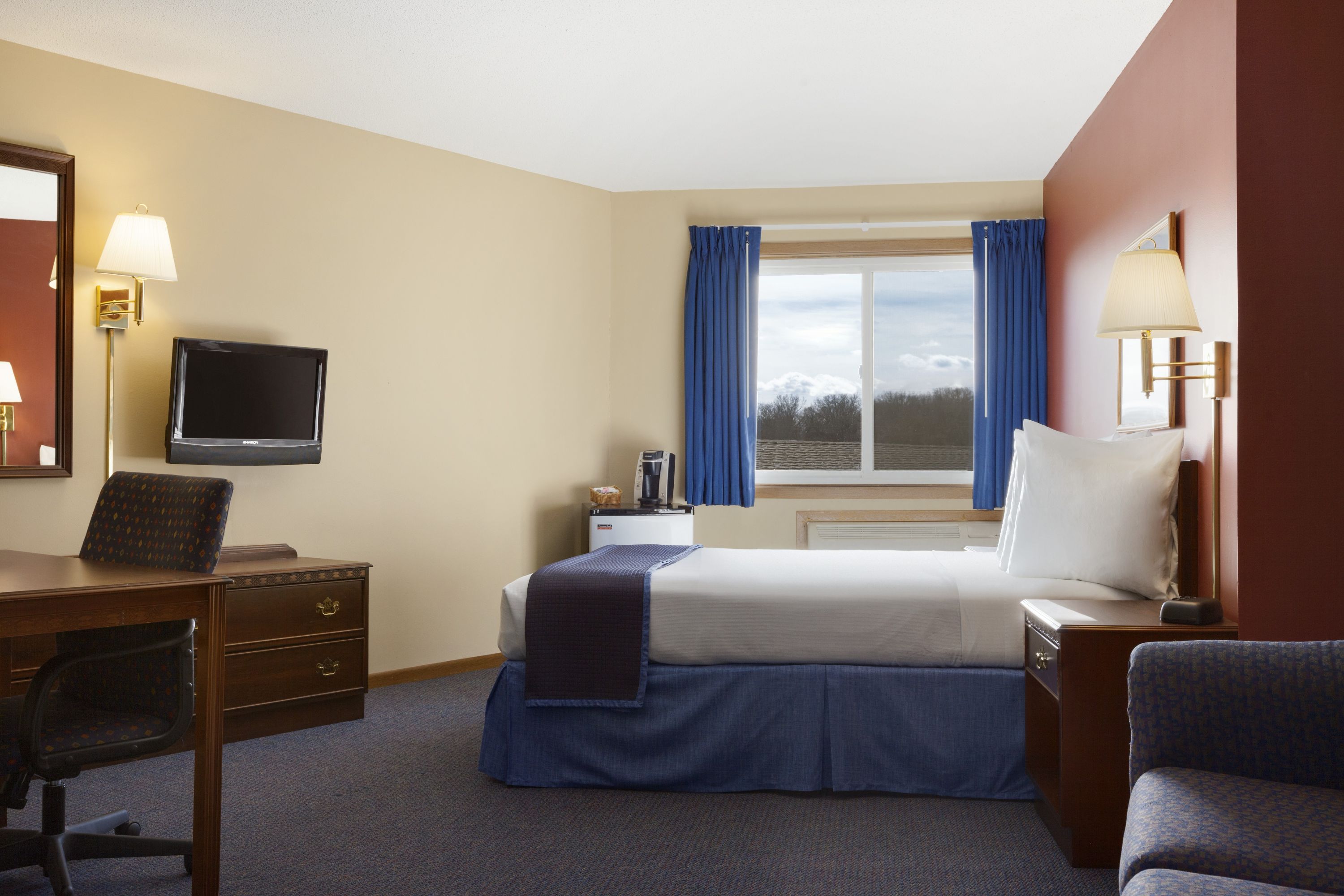 Guest room at the Travelodge by Wyndham Motel of St Cloud in Saint Cloud, Minnesota
