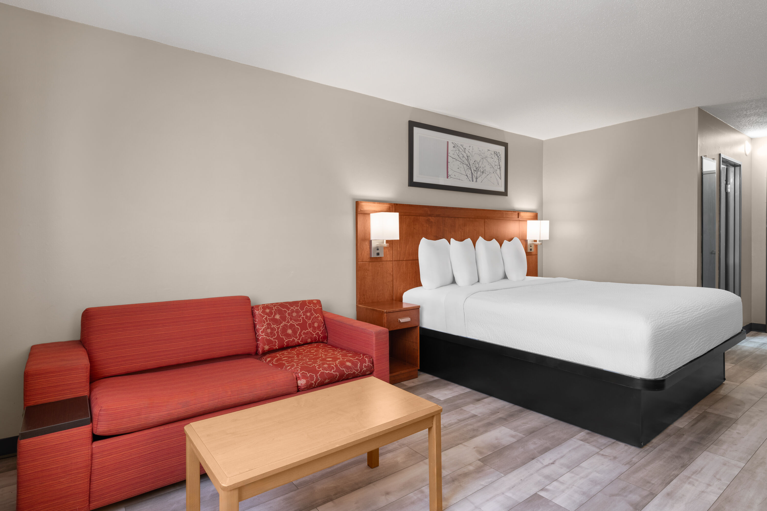 Guest room at the Travelodge by Wyndham Fargo West Acres in Fargo, North Dakota