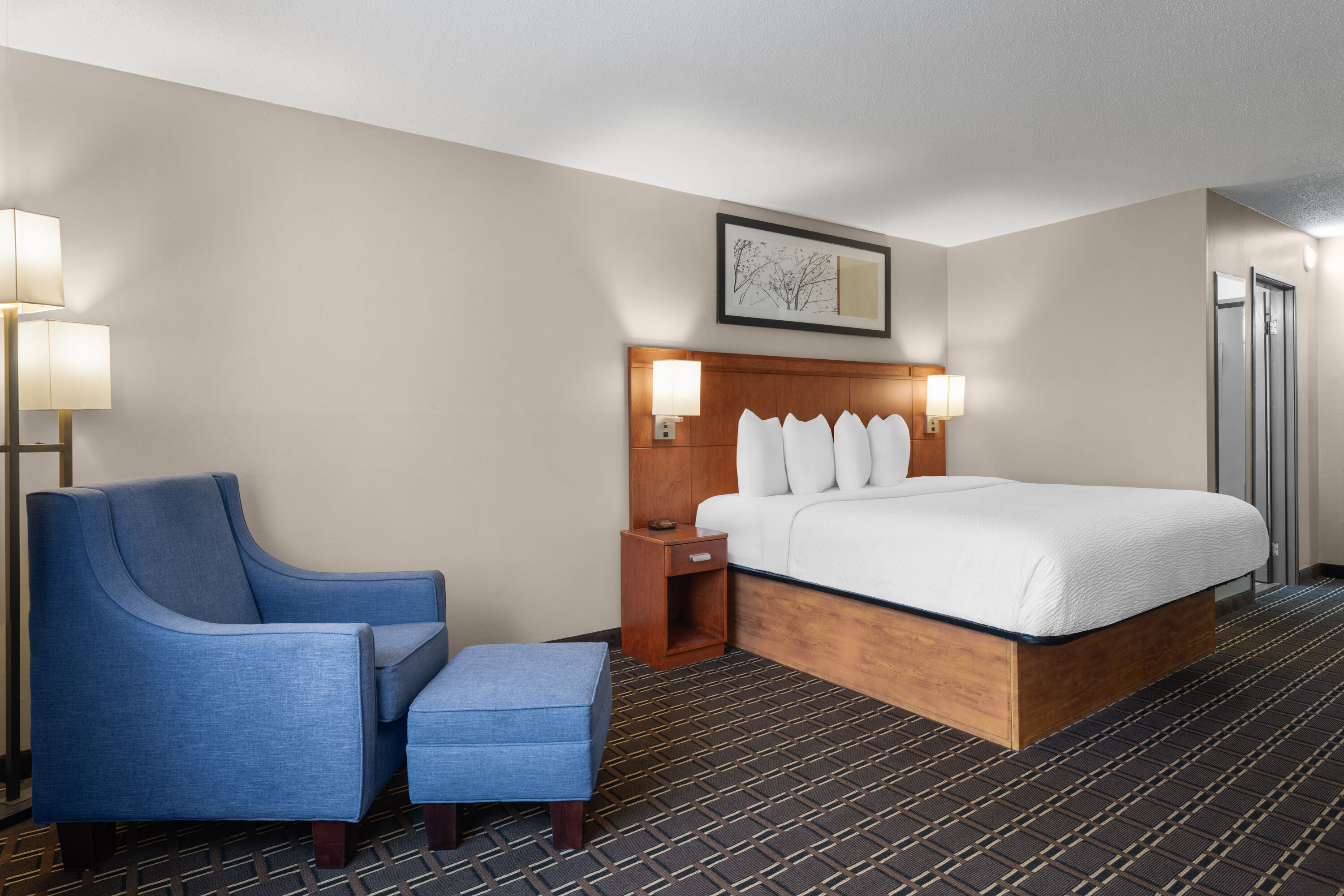 Guest room at the Travelodge by Wyndham Fargo West Acres in Fargo, North Dakota