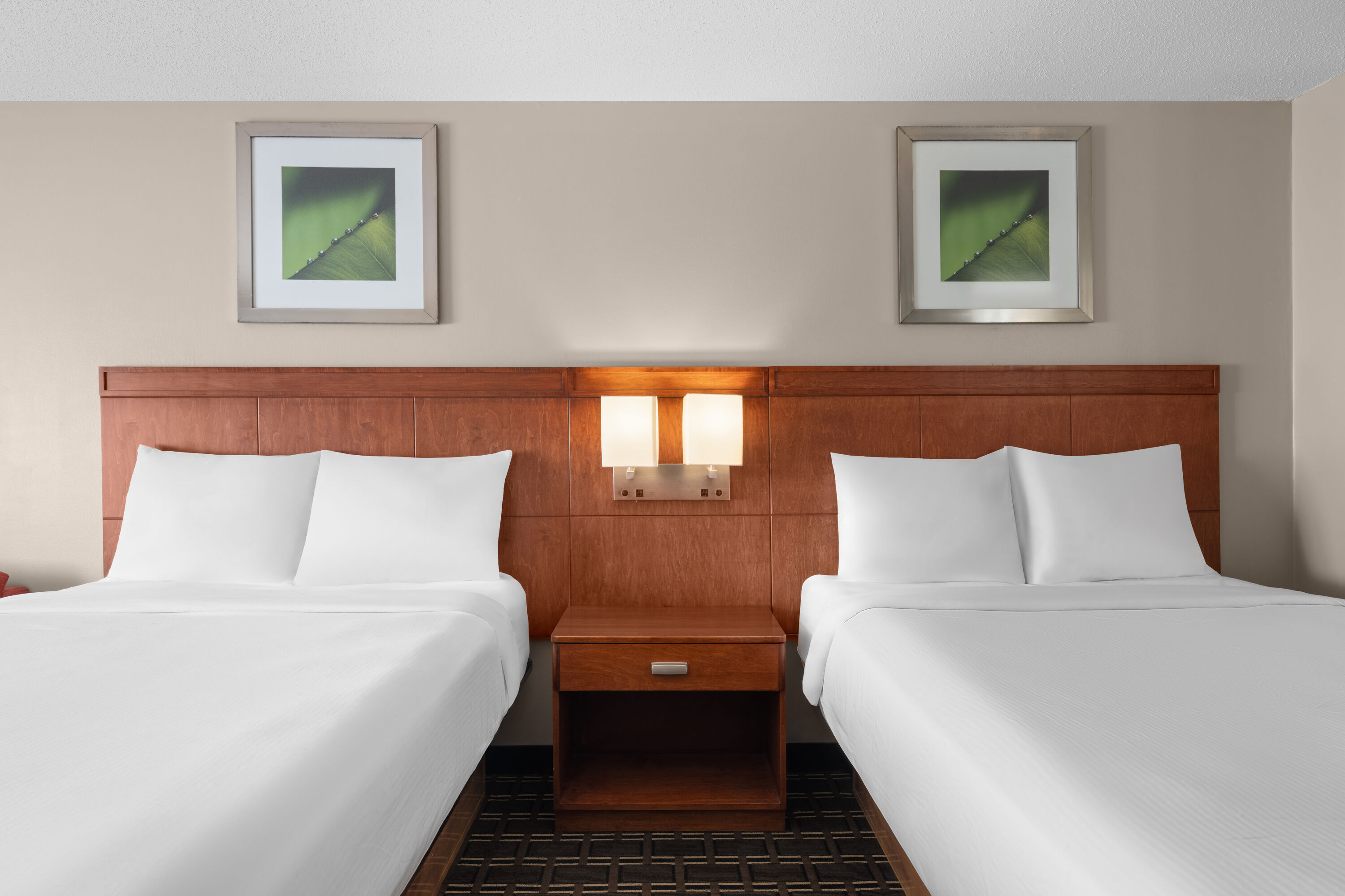 Guest room at the Travelodge by Wyndham Fargo West Acres in Fargo, North Dakota