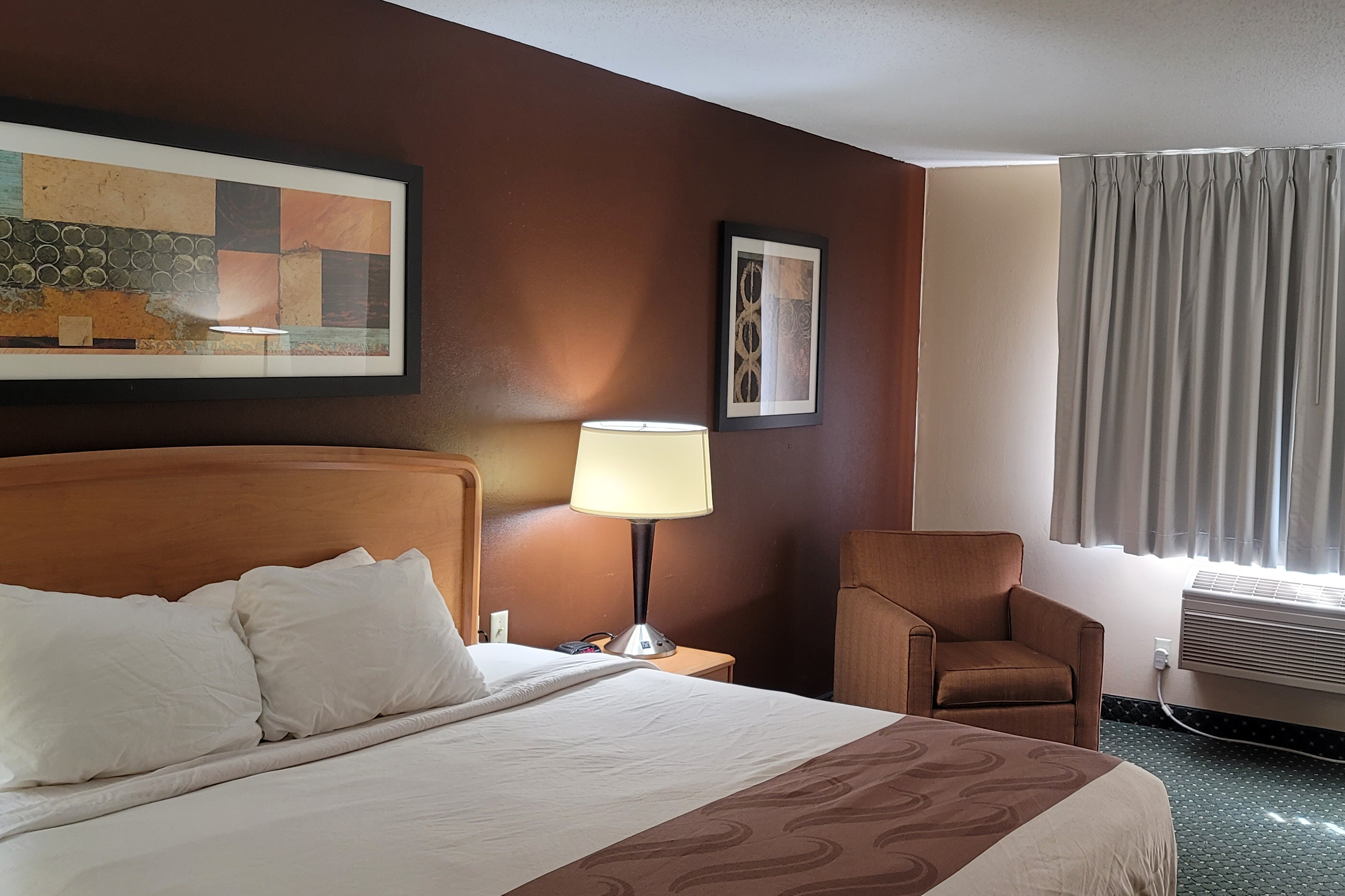 Guest room at the Travelodge by Wyndham Fargo West Acres in Fargo, North Dakota