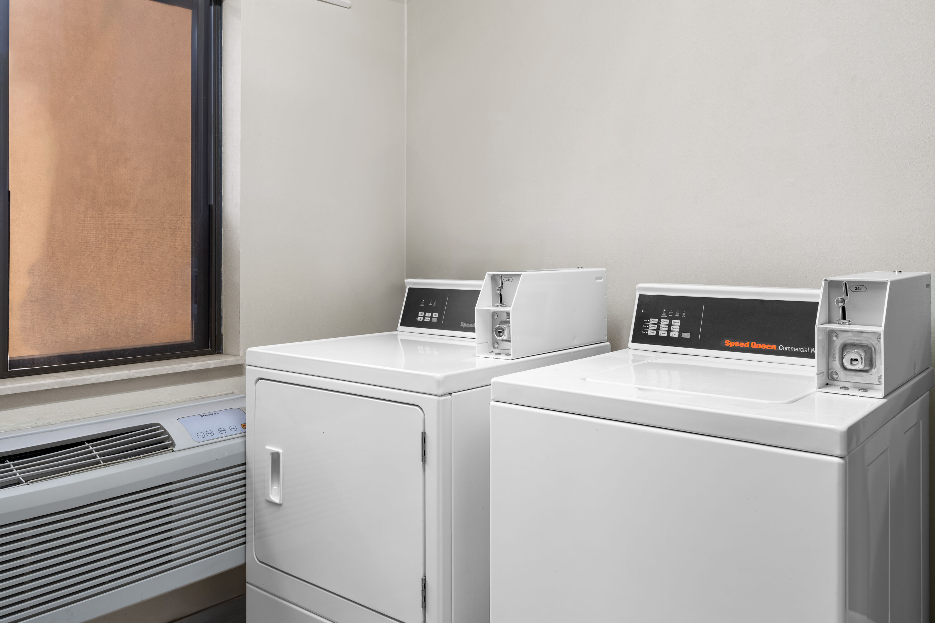 Laundry facilities at Travelodge by Wyndham Fargo West Acres in Fargo, North Dakota