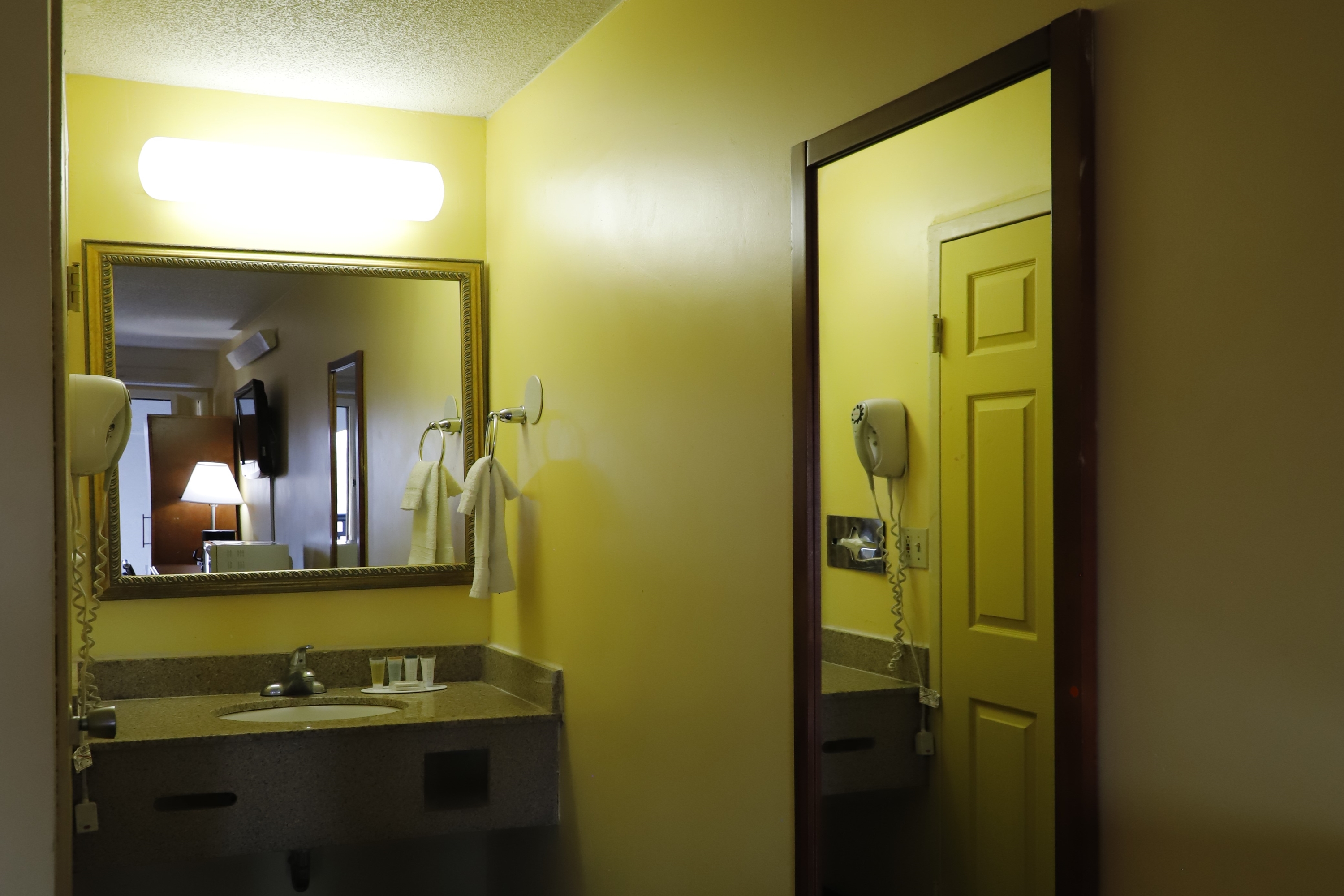 Guest room bath at the Travelodge by Wyndham Parsippany in Parsippany, New Jersey