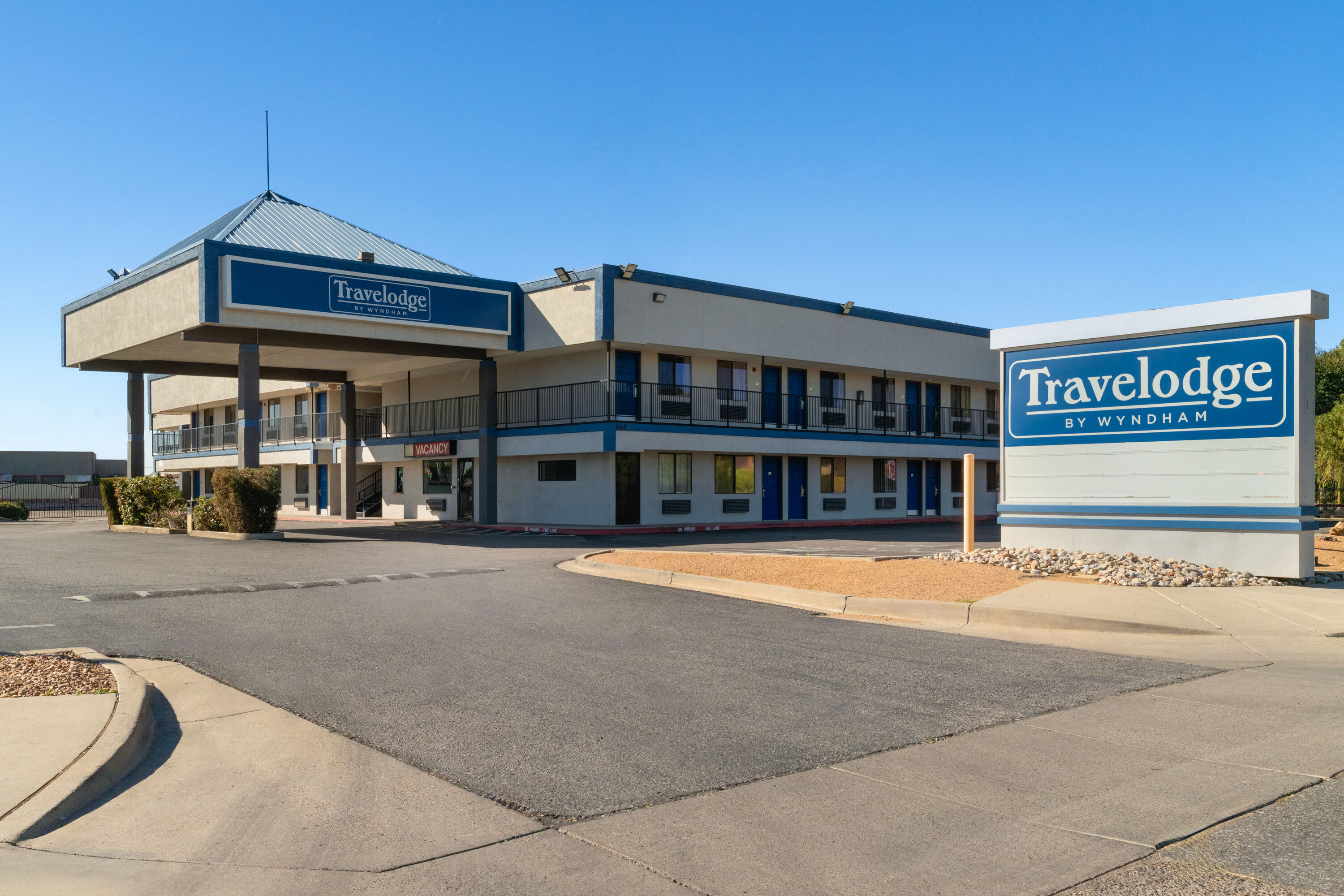 Exterior Day Image of Travelodge by Wyndham Albuquerque West hotel in Albuquerque, New Mexico