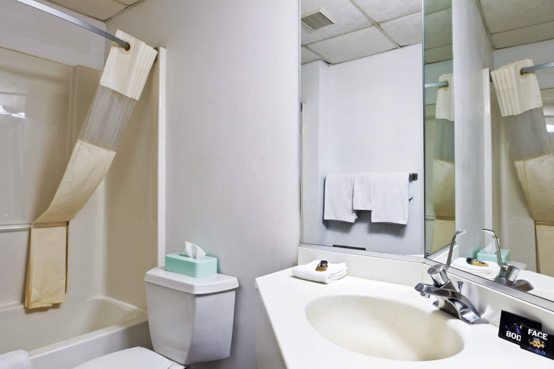 Guest room bath at the Travelodge by Wyndham Niagara Falls in Niagara Falls, New York