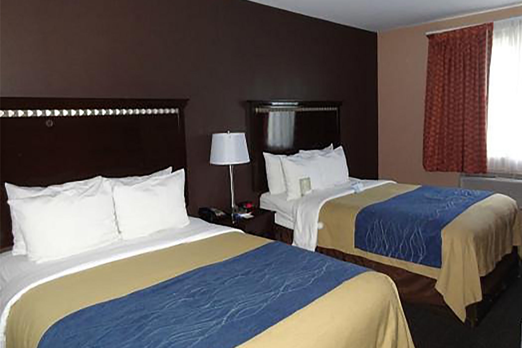 Guest room at the Travelodge by Wyndham Ozone Park in Ozone Park, New York