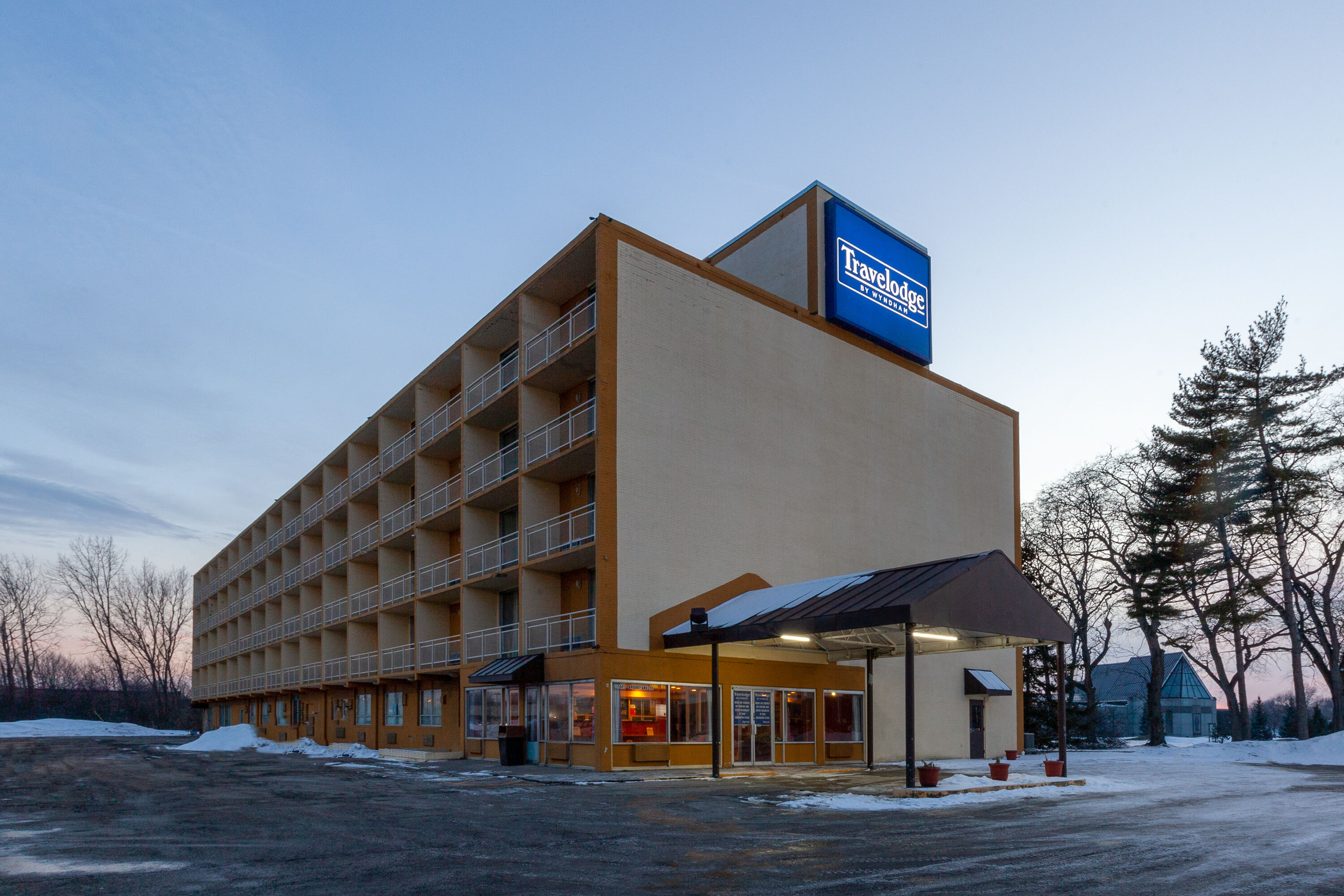 Exterior Dusk Image of Travelodge by Wyndham Cleveland Airport hotel in Brook Park, Ohio
