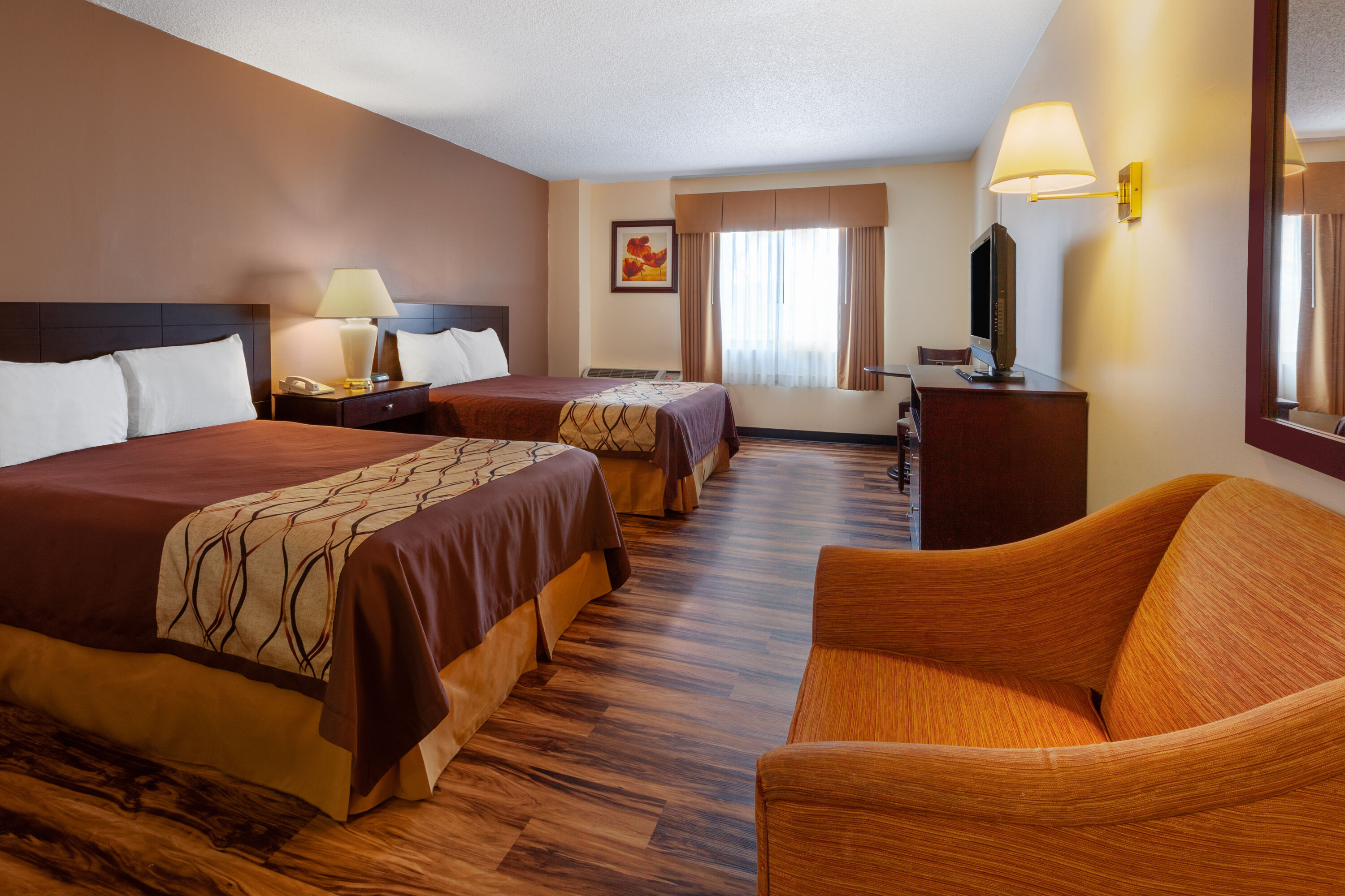 Guest room at the Travelodge by Wyndham Cleveland Airport in Brook Park, Ohio
