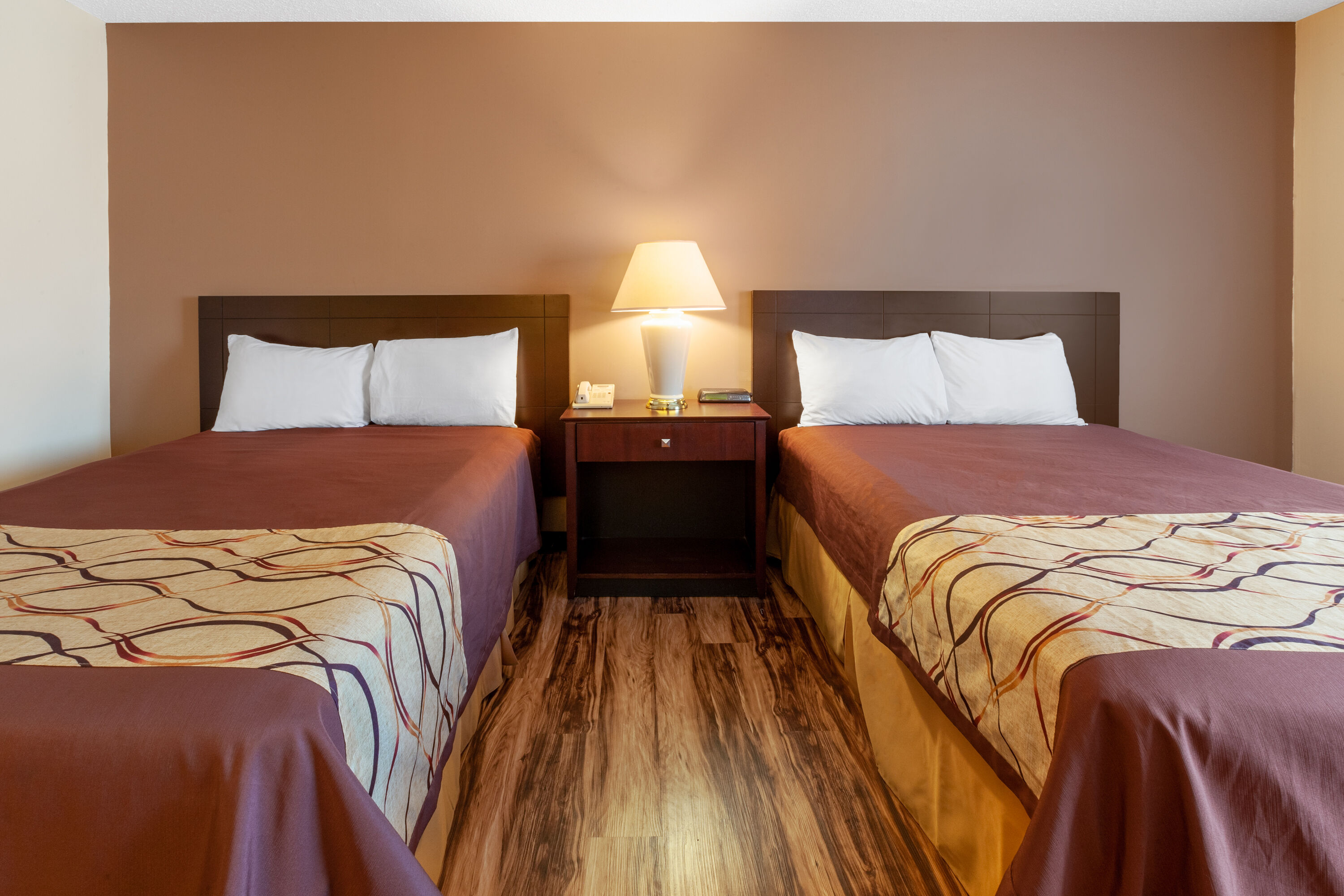 Guest room at the Travelodge by Wyndham Cleveland Airport in Brook Park, Ohio