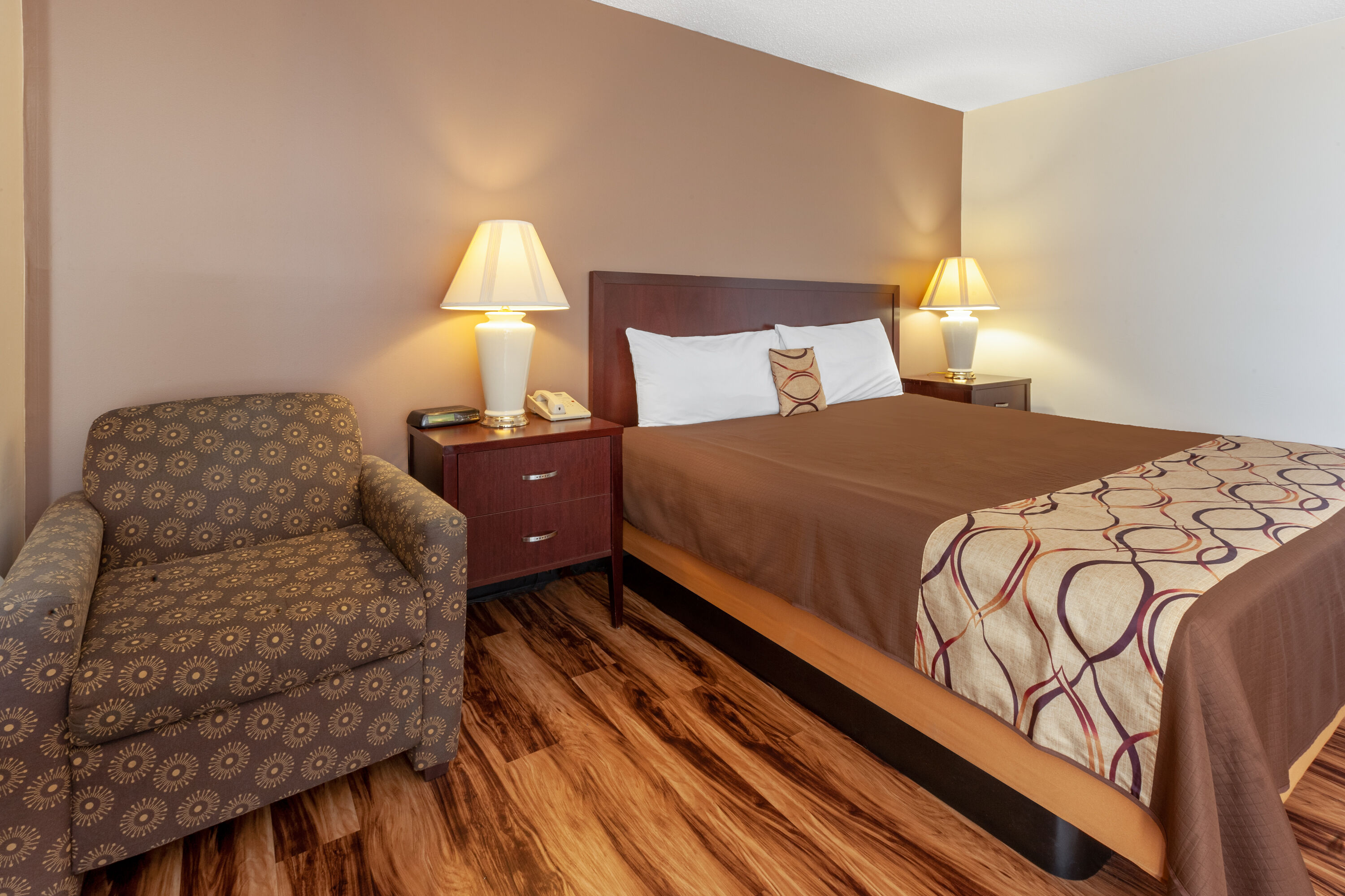Guest room at the Travelodge by Wyndham Cleveland Airport in Brook Park, Ohio