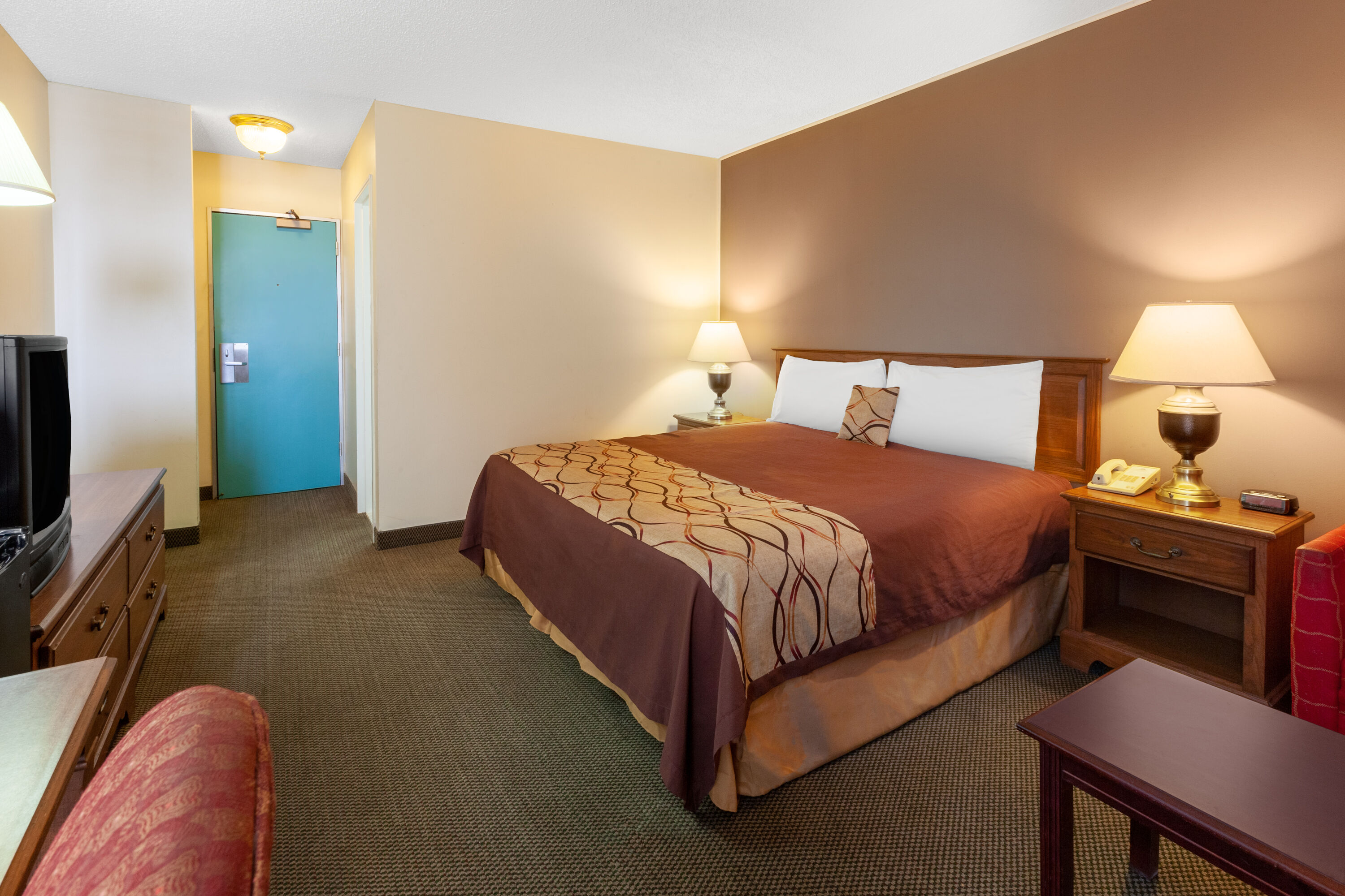 Guest room at the Travelodge by Wyndham Cleveland Airport in Brook Park, Ohio