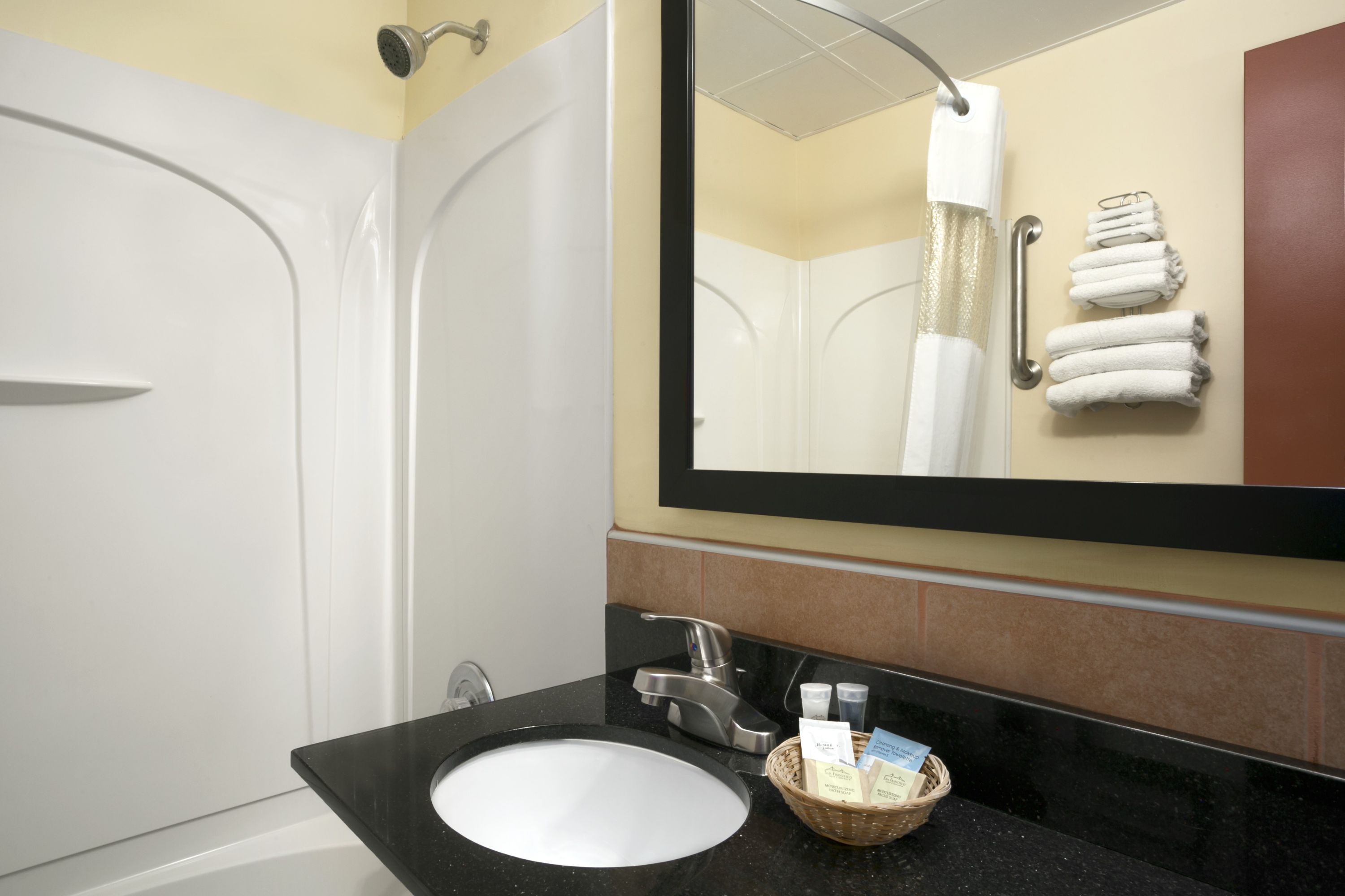 Guest room at the Travelodge by Wyndham Cleveland Lakewood in Lakewood, Ohio