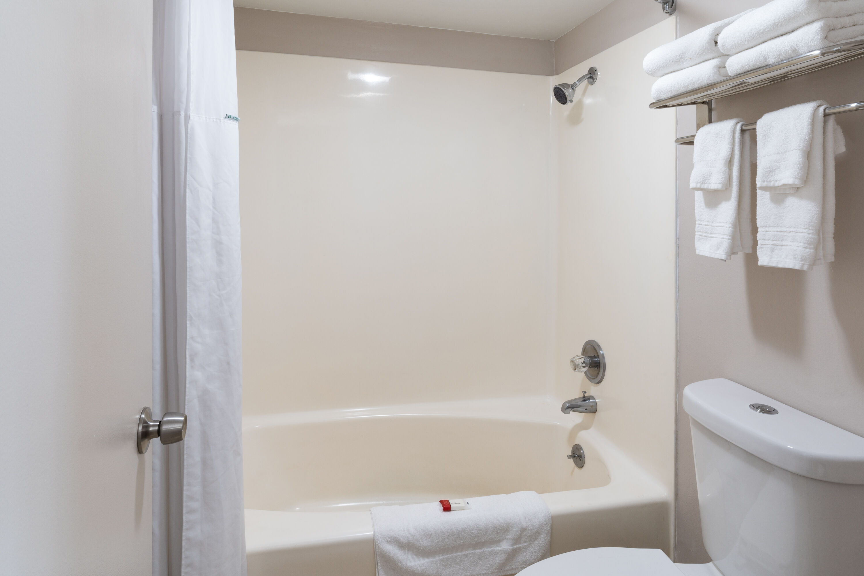 Guest room bath at the Travelodge by Wyndham Florence in Florence, Oregon