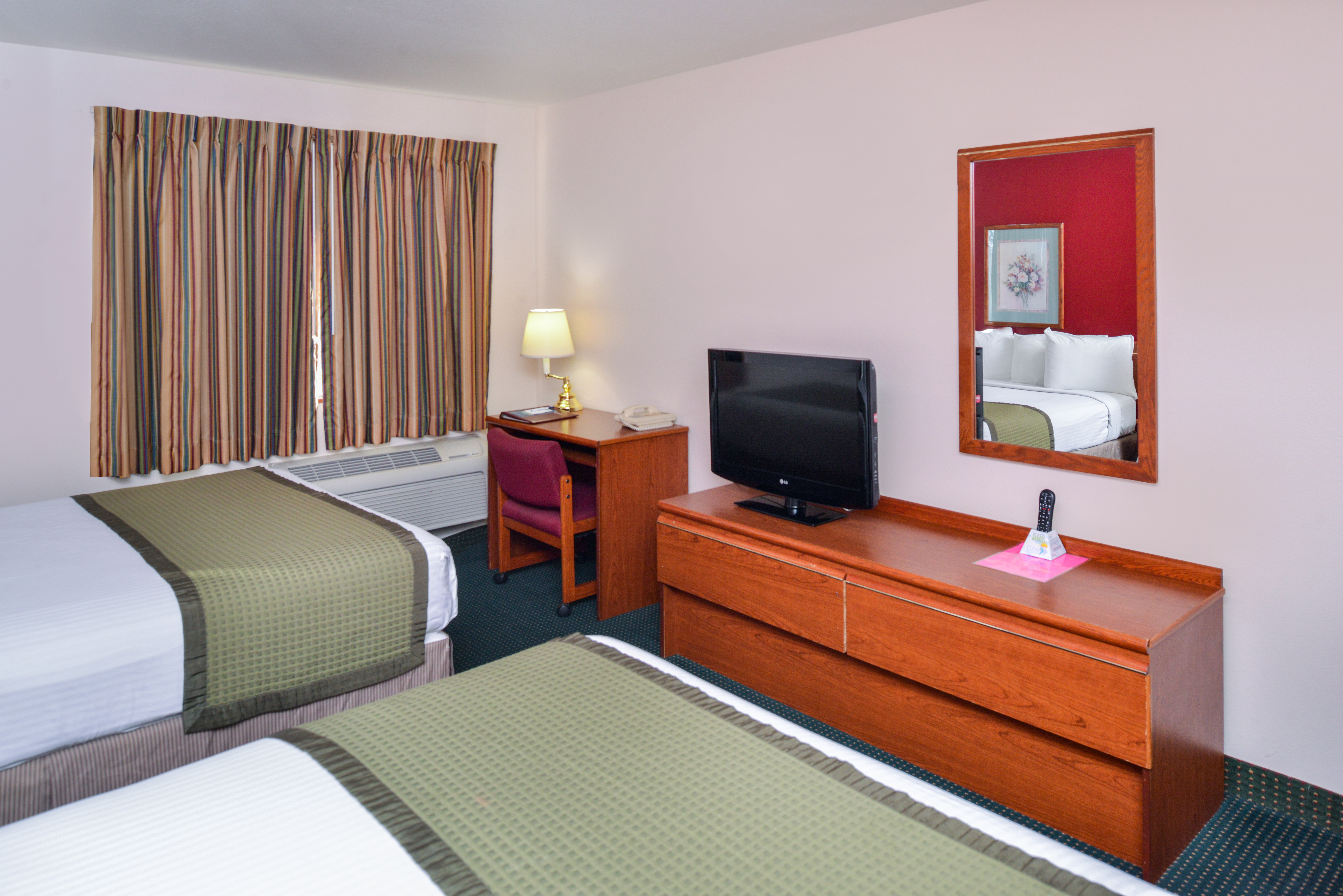 Guest room at the Travelodge Suites by Wyndham Newberg in Newberg, Oregon